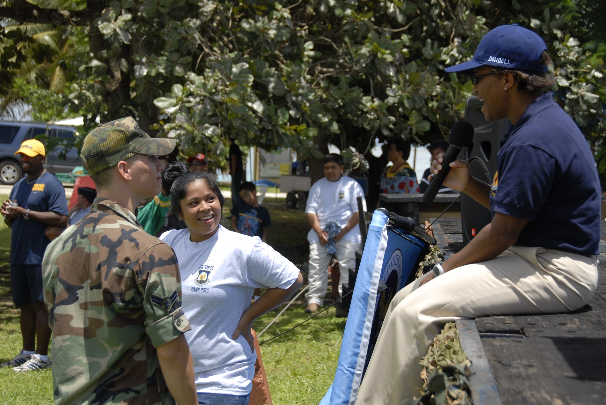 ANDERSEN AIR FORCE BASE GUAM, Maj. Richelle Dowdell, 36th Wing Public Affairs chief, quizzes people on the Air Force history during the Air Force demonstration Sept. 8 at Ypao Beach Park. (U.S. Air Force Photo by Airman First Class Daniel Owen)