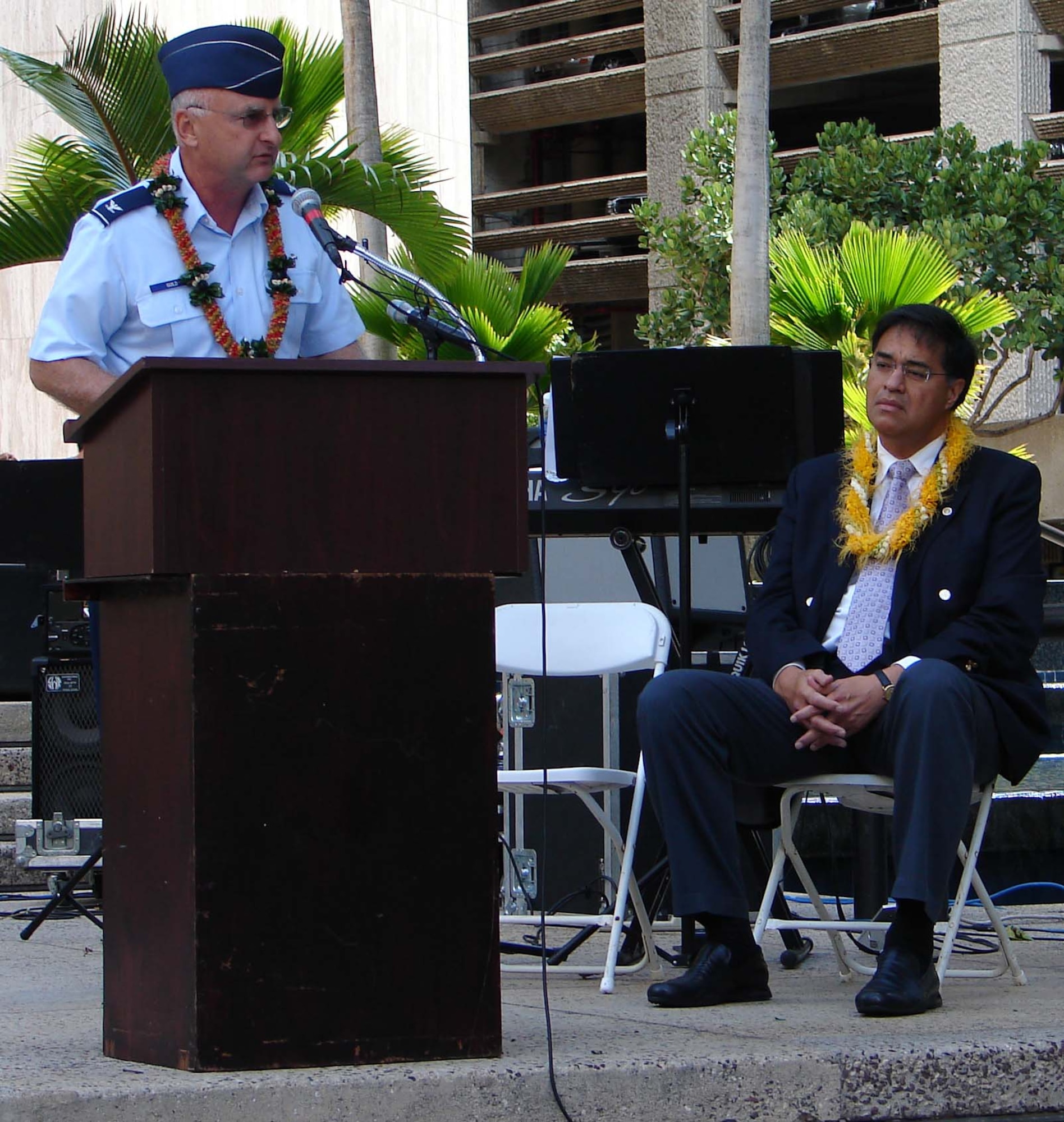 Chaplain (Col.) Jeffrey Guild performs the invocation at the Mayor's 9/11 remembrance ceremony held at Tamirand Park, Honolulu, Hawaii.  “Honor selfless men and women who serve today in our armed forces …. May this day serve to honor the brave citizens to put down their lives daily for our protection.” said Chaplain Guild. (U.S. Air Force photo/Capt. Allison Farabaugh)

