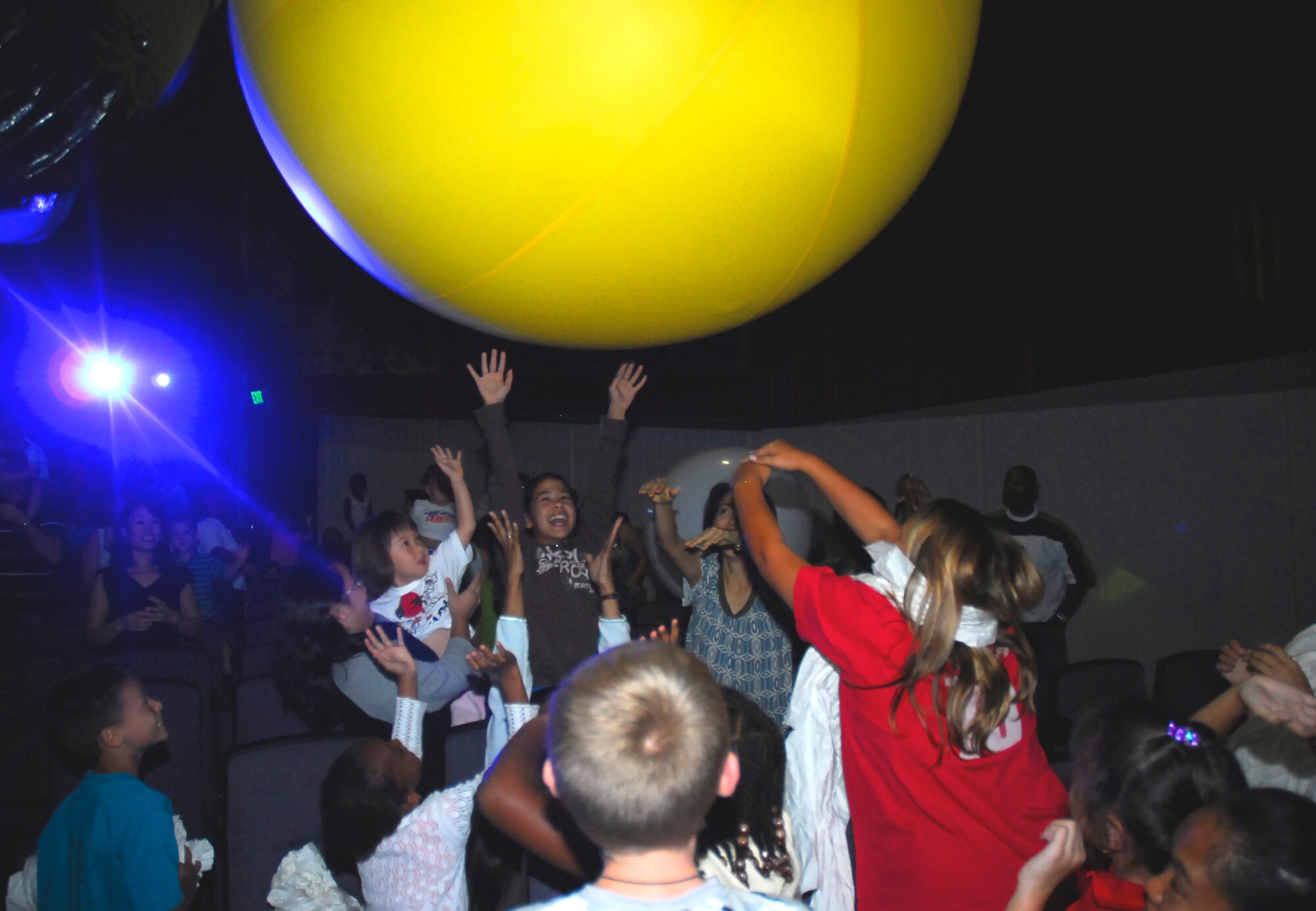 Audience members interact with a huge beach ball during the Aga Boom show at Kadena Air Base, Japan, Sept. 7, 2007.