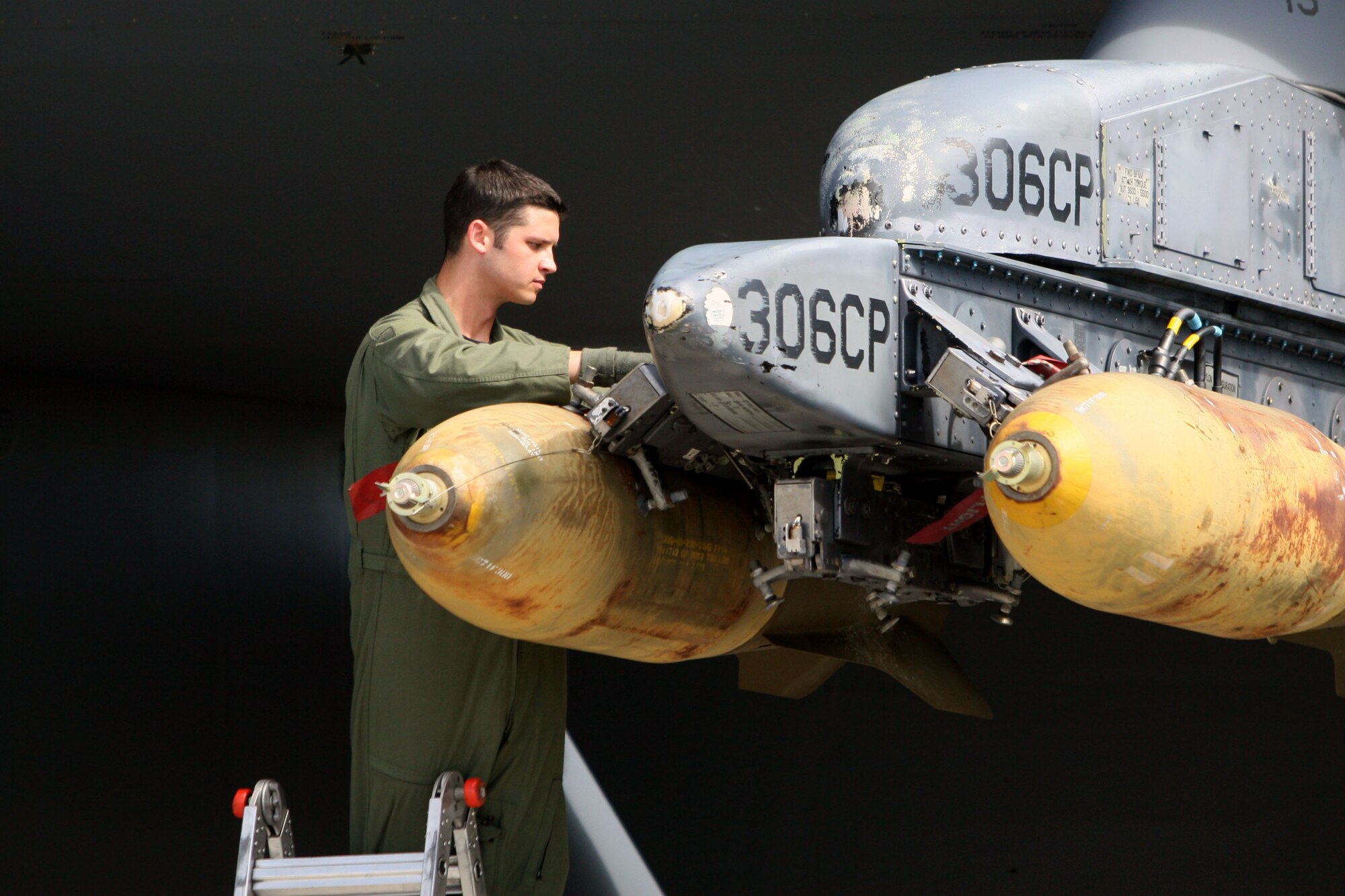 Capt. Jonathan Keller, 20th Expeditionary Bomb Squadron, inspects the armament on his B-52 Stratofortress before take off. The “BUFF” is a multi-mission capable bomber with the ability to deliver massive firepower on hardened enemy positions; however, it can switch roles and act as a mission commander for such delicate and precise missions as combat search and rescue thanks to its advanced communications package.  (Courtesy photo.)

