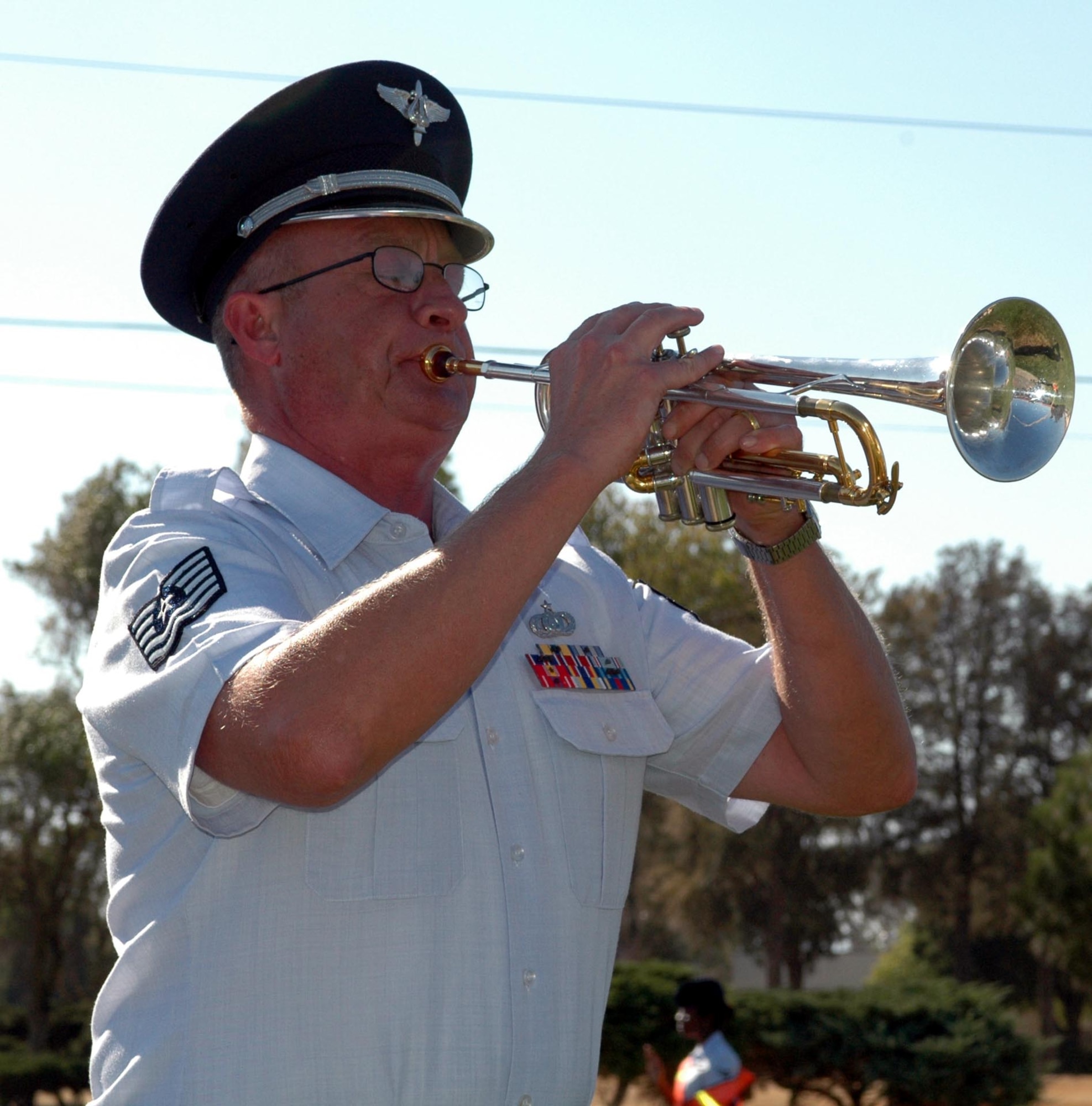 A member of the USAF Band of the Golden West performs "Taps" during Team Travis' Sept. 11 Remembrance ceremony and retreat. (U.S. Air Force photo/Staff Sgt. Candy Knight)