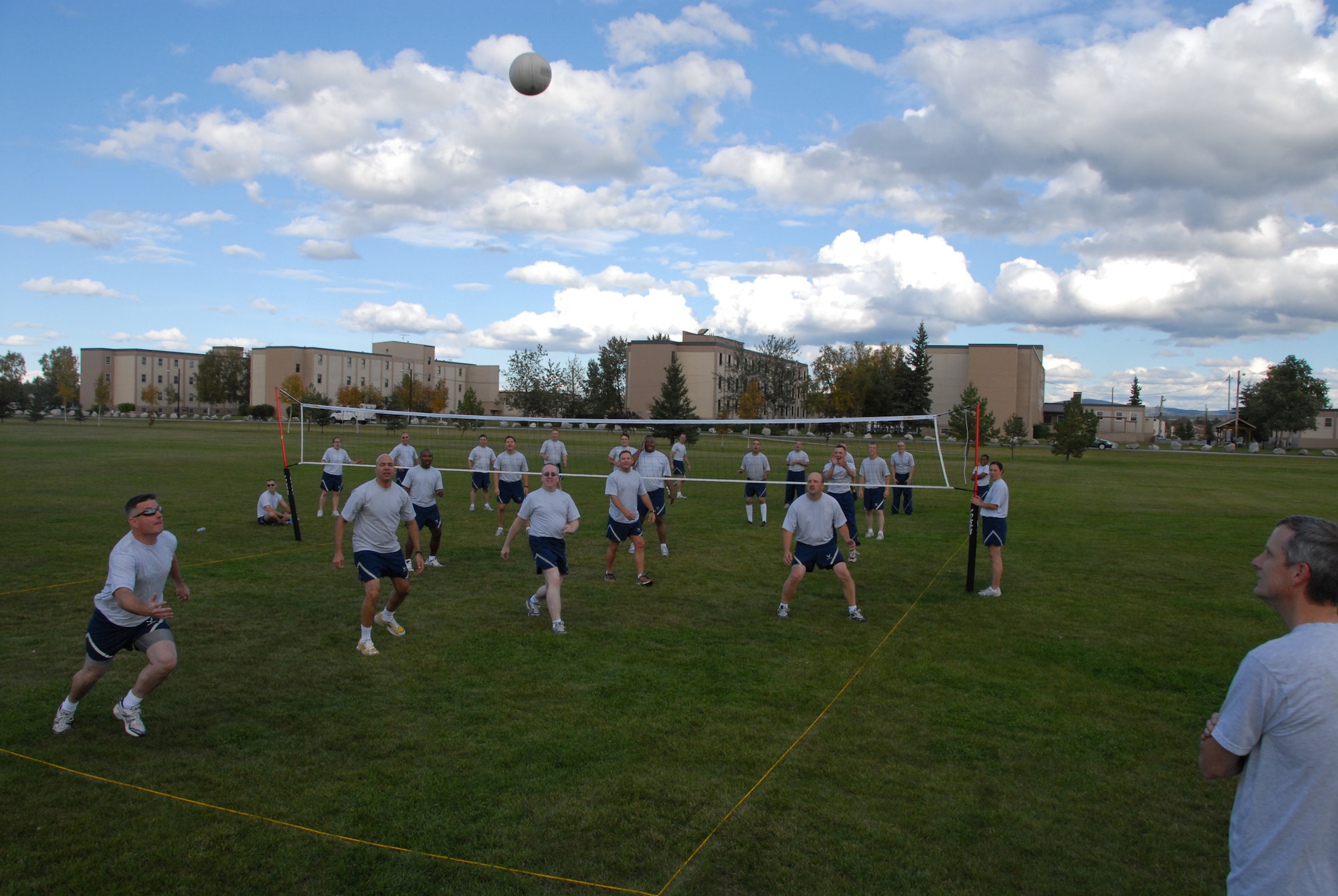 EIELSON AIR FORCE BASE, Alaska -- Chief Master Sgt. Stephen Ludwig, 354th Fighter Wing command chief, runs to get the ball during a volleyball game against Airman Leadership School Sept. 7 inbetween the dormitories. The Airman block party was hosted by Airman Committed to Excellence in efforts to raise morale on base before the long winter. The Chiefs went on to win all three games against the ALS students. (U.S. Air Force Photo by Airman 1st Class Jonathan Snyder) 