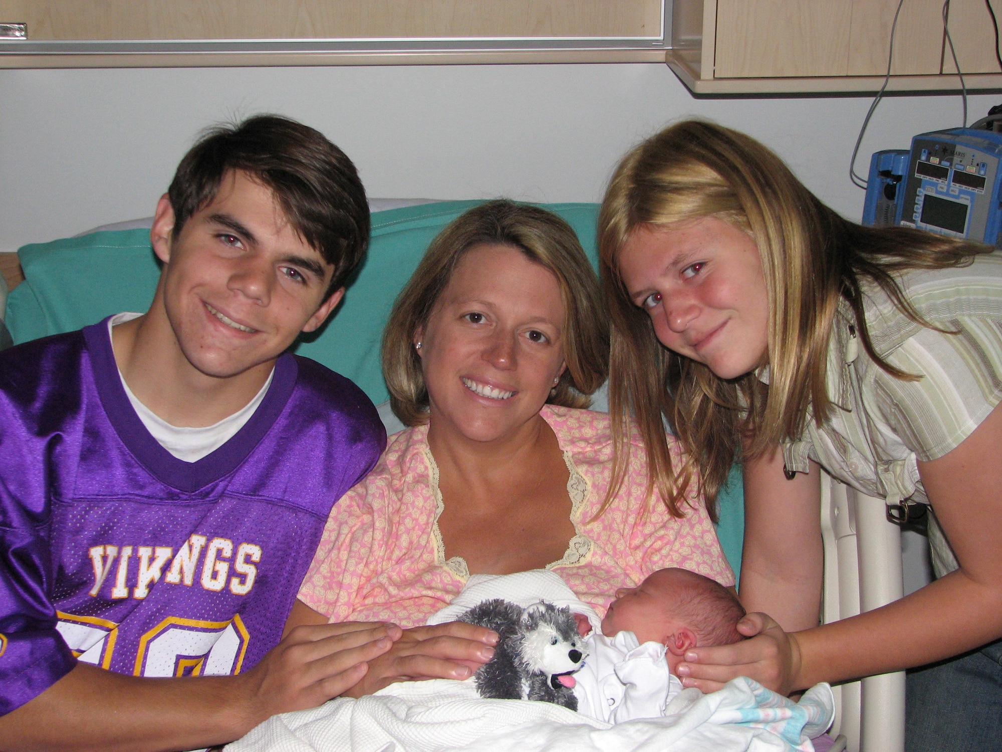 EIELSON AIR FORCE BASE, Alaska--Big brother, Cameron; mother, Lisa and big sister, Maggie, pose for a picture with new born Lillie O'Quinn Aug. 27 at Bassett Army Community Hospital, Fort Wainwright. Mrs. O'Quinn self-delivered Lillie in the car on the way to the hospital while she and her husband passed through North Pole on the Richardson Highway. (U.S. Air Force photo by Maj. James O'Quinn)