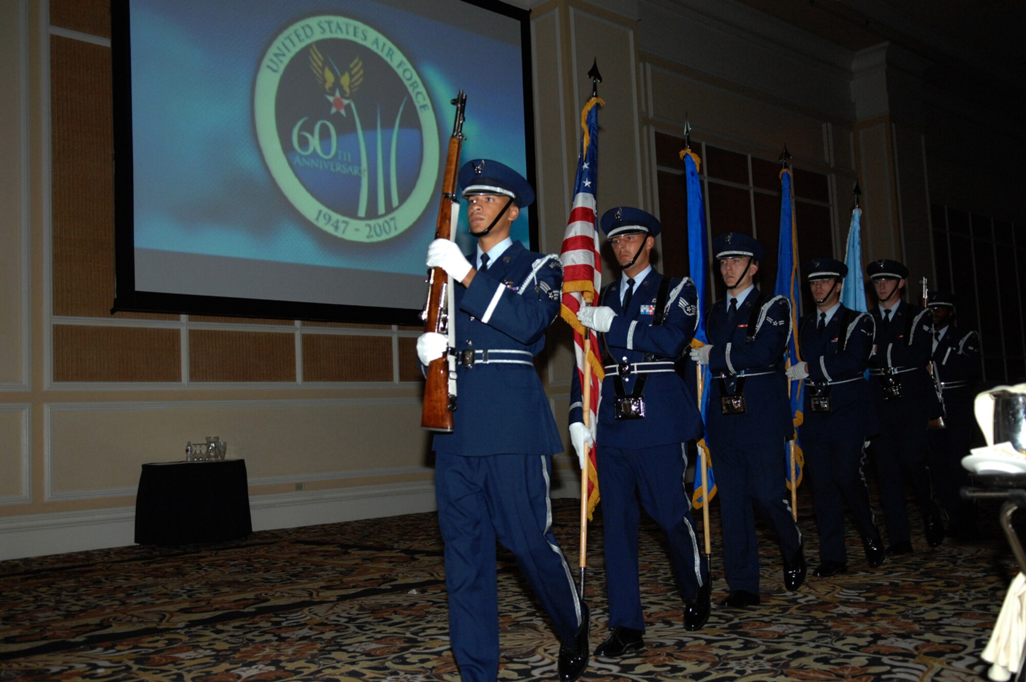 Members of the Nellis Air Force Base Honor Guard, prepare to post the colors during the 60th Anniversary Air Force Ball September 8, 2007 at the Mirage Hotel and Casino Las Vegas, NV.
(U.S. Air Force photo by Senior Airman Larry E. Reid Jr.)