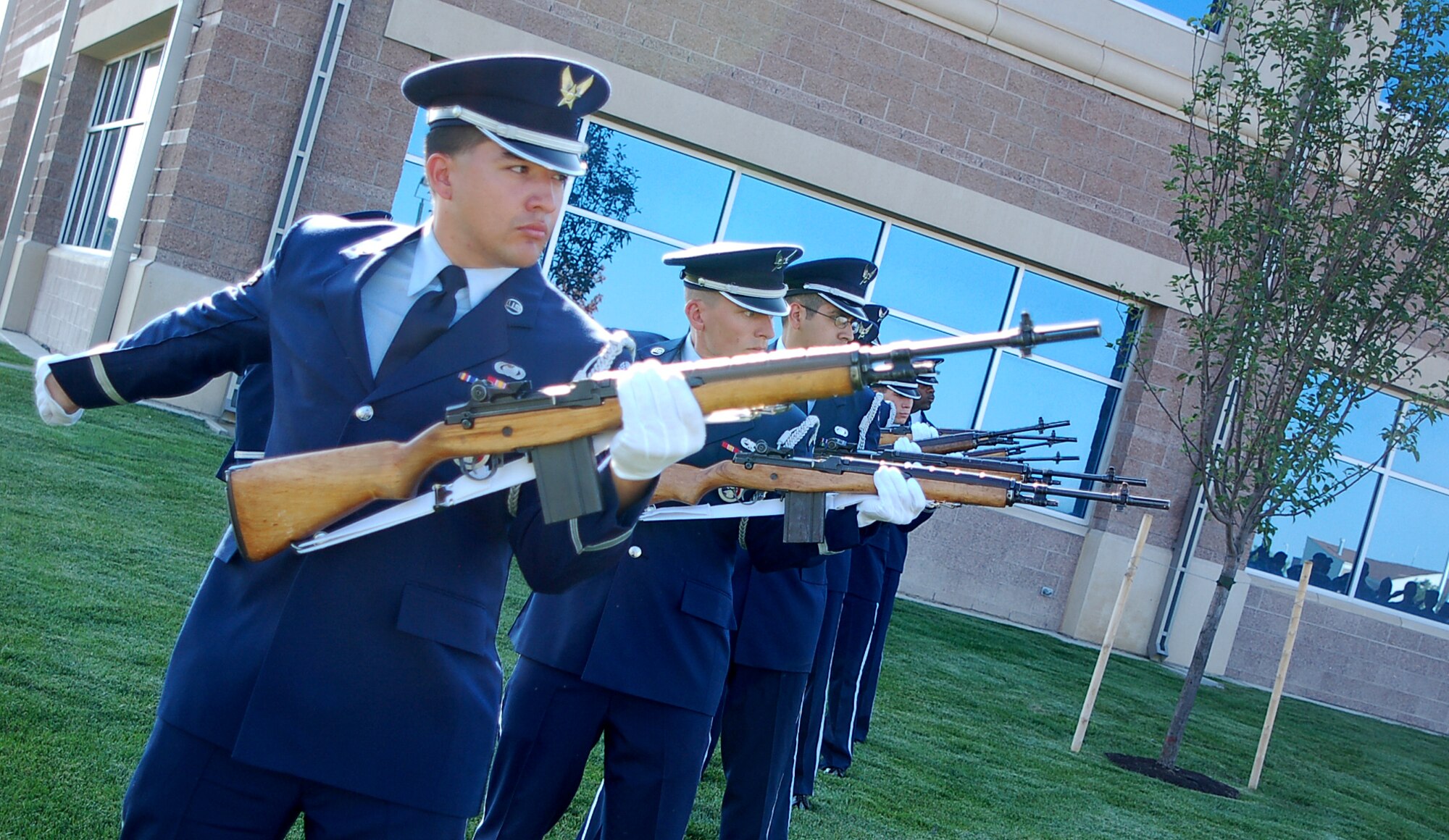 BUCKLEY AIR FORCE BASE, Colo. - Airman 1st Class Jeremy Ford and six other Buckley Honor Guard members render a 21-gun salute to the victims of Sept. 11, 2001 during Buckley's Patriot Day ceremony. 

The base remembered the 6th anniversary of 9/11 with a formal Retreat ceremony, a moment of silence, a 21-gun salute and the playing of Taps. Members of the 460th Mission Support Group, Operations Group and Medical Group made up the formation for the ceremony. Col. Wayne McGee, 460th Space Wing commander, provided remarks. (U.S. Air Force photo by Senior Airman Jacque Lickteig)