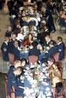 FAIRCHILD AIR FORCE BASE, Wash. – Members of Team Fairchild and their guests enjoy the evening meal at the 2007 Air Force Ball in commemoration of the 60th Anniversary of the Air Force. The night included remarks from guest speaker retired Gen. Charles Robertson, former commander of Air Mobility Command and U.S. Transportation Command. (U.S. Air Force photo / Senior Airman Chad Watkins)