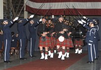 FAIRCHILD AIR FORCE BASE, Wash. – Bagpipers march through the Honor Guard cordon to mark the beginning of the ceremony and to lead the grand march of commanders and distinguished guests. Other bands that provided musical entertainment to the guests were the Air Force Band of the Golden West, from Travis Air Force Base, Calif., and the Washington Air National Guard’s Band of the Northwest. (U.S. Air Force photo / Senior Airman Chad Watkins)