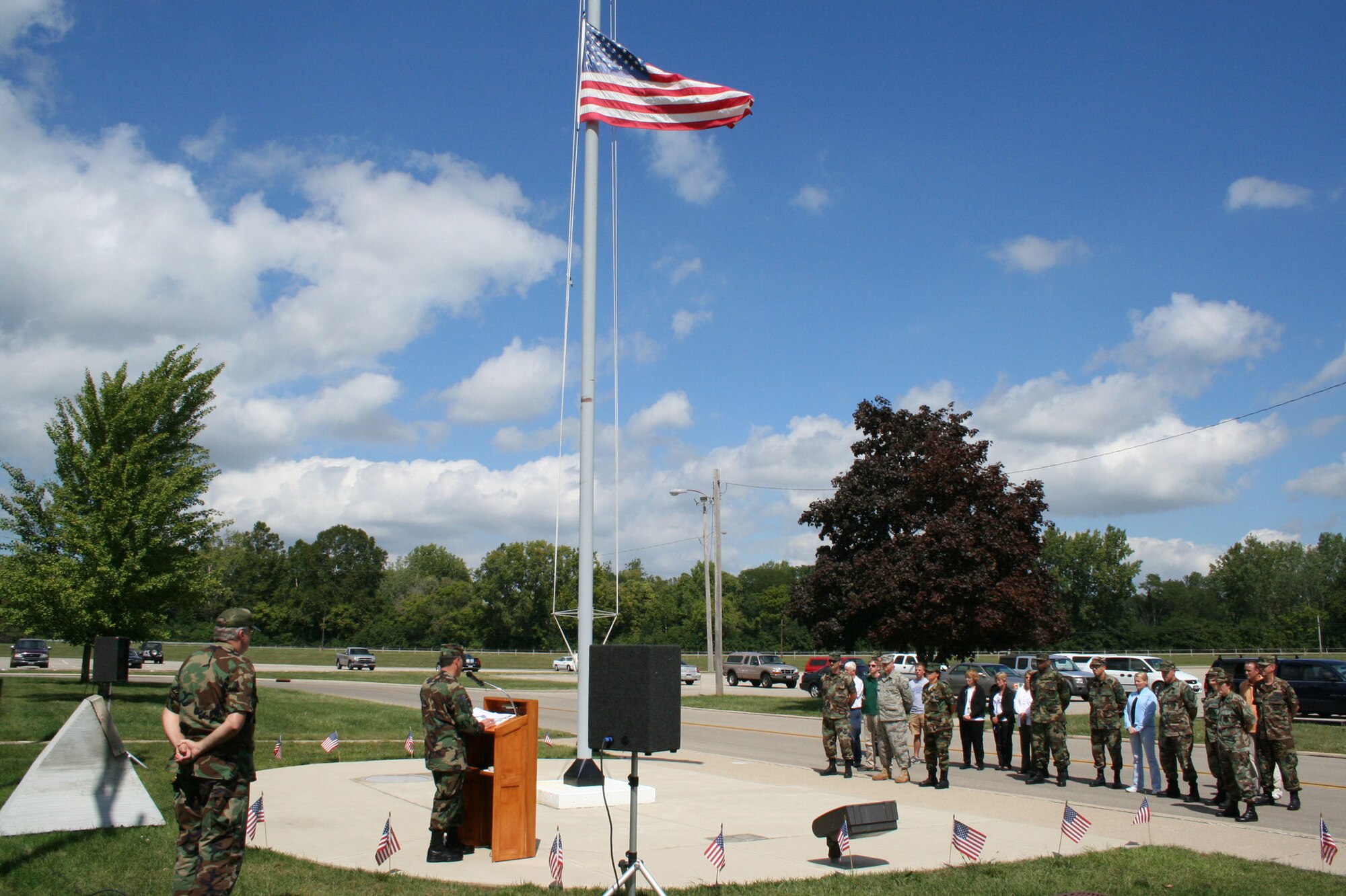 Reservists from the 445th Airlift Wing gather together September 11, 2007, to remember the men, women, and children who lost their lives on that September day six years ago.  445th Command Chief Aaron Mouser highlighted a former reservist with the wing, Maj. Leroy Homer, who was aboard United Flight 93 which crashed in the fields of Pennsylvania.  (U.S. Air Force photo/Mary Allen) 