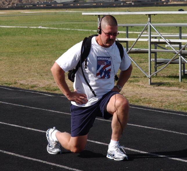 Master Sgt. Jimmy Jackson, 341st Logistics Readiness Squadron first sergeant, mixes a combination of walk, jog, lunge and sprint as part of his regular training regiment in preparation for Saturday's Air Force Marathon. (U.S. Air Force photo/Valerie Mullett)