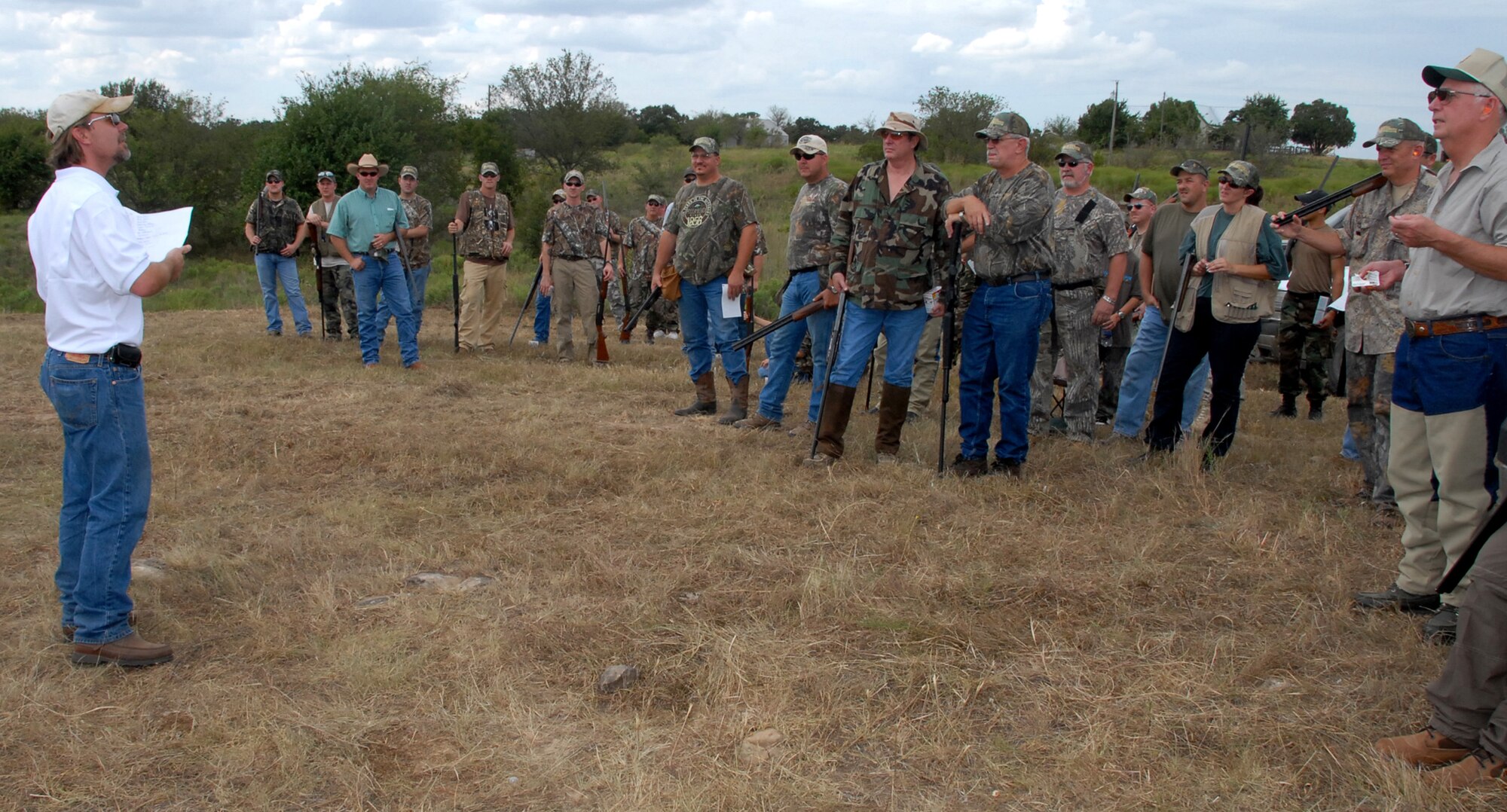 Dr. Joe Wurster, a local veterinarian, provides instructions Sept. 8 to participants in a skeet shooting competition during the 3rd Annual Clay County Dove Hunt Salute to the Military. Hunters were treated to shooting clay pigeons since the opportunity to hunt dove was limited because very few were flying. Active-duty military and their guests were invited to participate in the hunt. (U.S. Air Force photo/Mike Litteken)