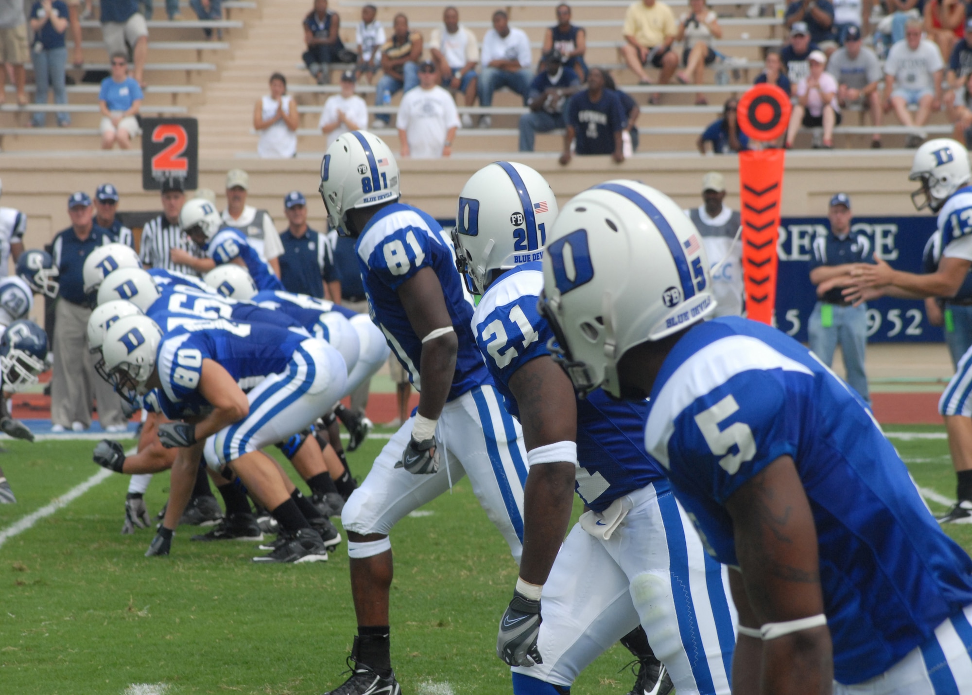 Three offensive weapons for Duke await the snap of the ball in the first half of Duke's college football season opener Sept. 1. The Duke Athletic Department hosted the Marine Band, Army Golden Knights and arranged an North Carolina National Guard Apache Helicopter flyover as part of their Military Appreciation Game.  (U.S. Air Force photo/Staff Sgt. Jon LaDue)