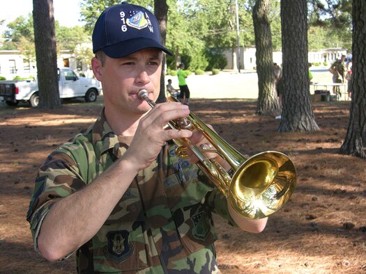 SEYMOUR JOHNSON AIR FORCE BASE, N.C. --After the pledge of allegiance to the flag, Master Sgt. Tim Edwards plays TAPS before the retiring of many United States flags.  Sergeant Edwards is the chaplain's assistant with the 916th Air Refueling Wing.  The ceremony was held during the September unit training assembly.