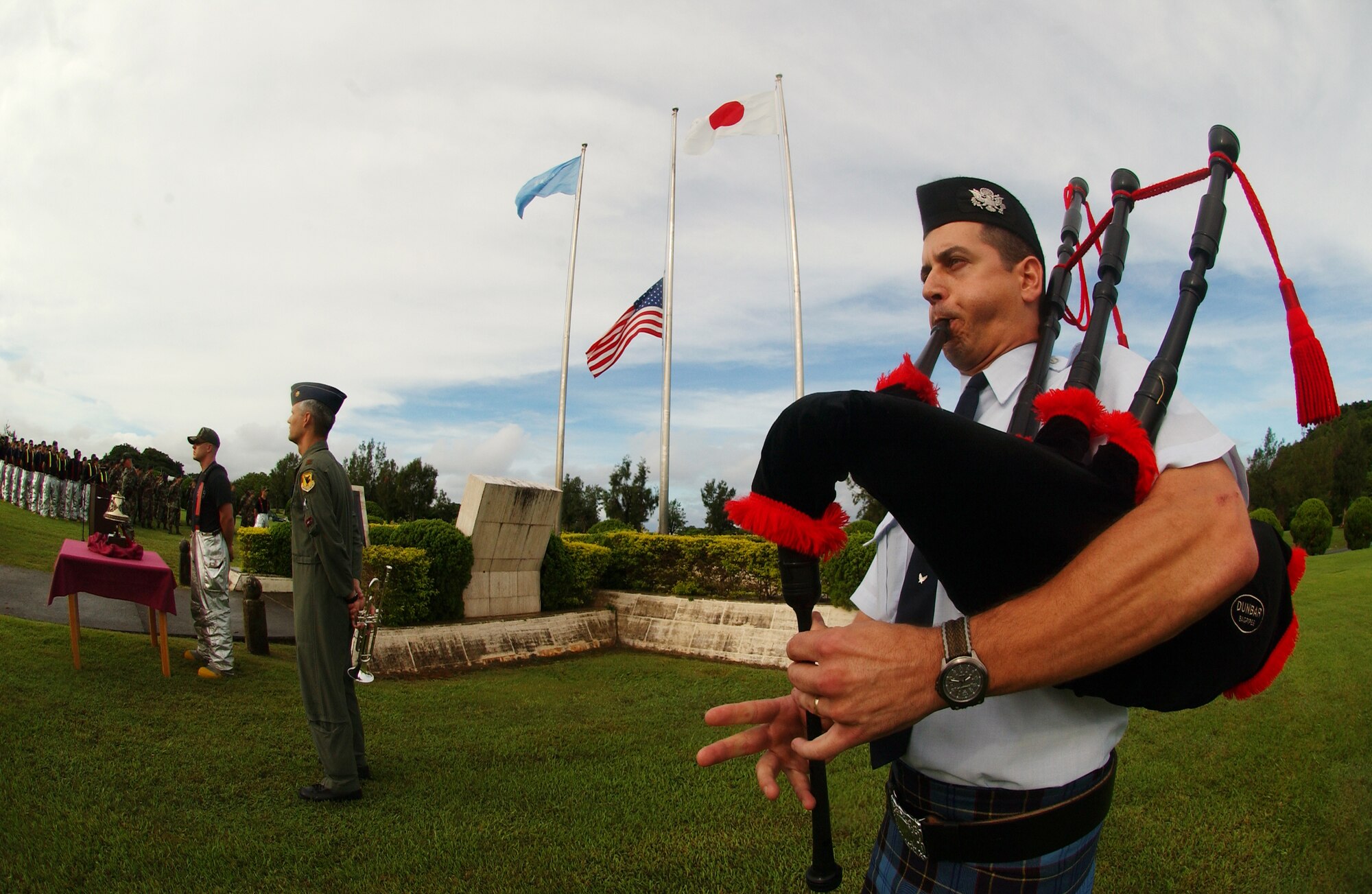 Maj. Chris Iriarte, 18th Equipment Maintenance Squadron, plays the bagpipes during the 9/11 memorial ceremony at Kadena Air Base, Japan, Sept. 11, 2007.
(U.S. Air Force photo/Tech. Sgt. Reynaldo Ramon)

