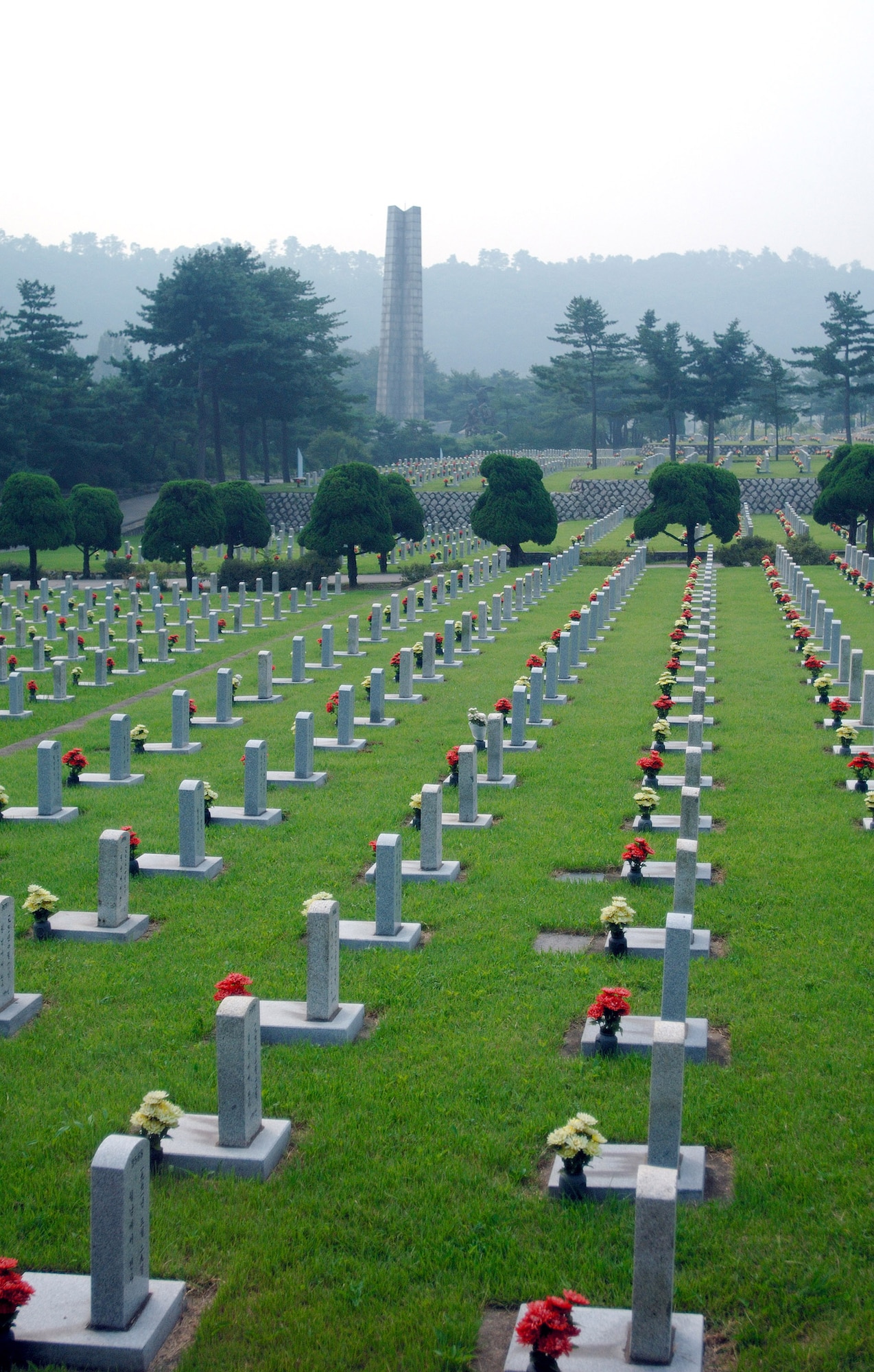 Thousands of Korean War tombstones cover the the South Korean National Ceremony. The South Korean government's Revisit Korea program invites war veterans each year to come to South Korea to honor the men and woman from 21countries who served during the Korean War. Nearly 25,000 veterans have participated in this program since 1975. (U.S. Air Force photo/Staff Sgt. Bennie J. Davis III) 
