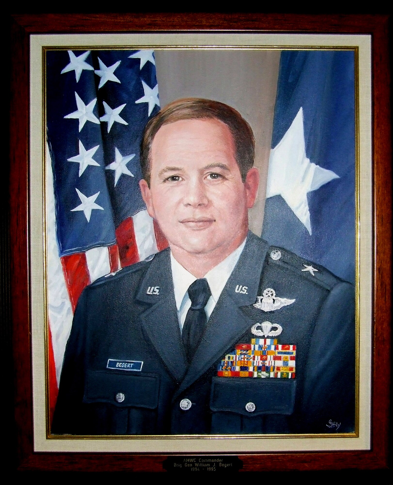 This portrait of Brig. Gen. William J. Begert, the first commander of the Air Mobility Warfare Center, now known as the Air Force Expeditionary Center, hangs on the walls of the Center on Fort Dix, N.J. General Begert, along with his wife, Judy, were responsible for bringing a large collection of art from the Air Force Art Program to the center when he became commander in 1994. The center holds Air Mobility Command's second largest collection of Air Force art on display. (U.S. Air Force photo/Tech. Sgt. Scott T. Sturkol) 
