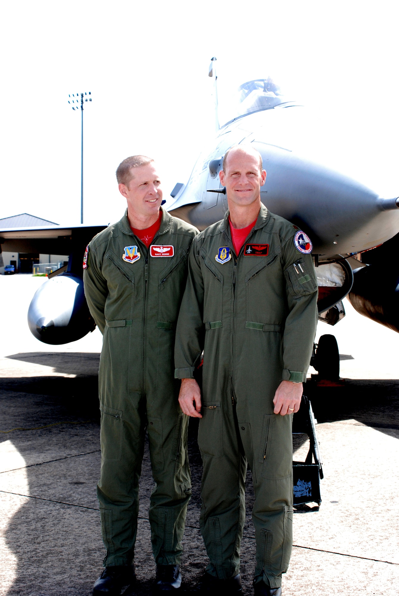 Majors Gary "Ham'n" and Lane "Snap" Beene are more than blood brothers; they are banded together via the Air Force. The first and youngest, is an active-duty F-15 pilot assigned to the 60th Fighter Squadron out of Eglin Air Force Base, Fla., and the other is a fulltime Air Force Reserve F-16 pilot with the 457th Fighter Squadron at the Naval Air Station Joint Reserve Base Fort Worth, Texas. Sunday was only the second time in their military careers that they flew together, or rather against each other in what has been deemed, a cage match. When asked who won the match -- well, let's just say the answer differs between the brothers. The air-to-air combat training these pilots get by pairing different fighter jets together gives them an opportunity to train on air-to-air combat tactics rather than air-to-ground.