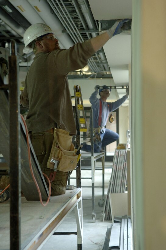 Civilian contractor Casey Dawson frames a softet inside the Air Force Financial Services Center April 2 at Ellsworth Air Force Base, S.D. The AFFSC will consolidate financial services from 93 bases into a single location, employing up to 775 civilian and military personnel, making the AFFSC at Ellsworth the financial hub of the Air Force. (U.S. Air Force photo/Staff Sgt. Michael B.  Keller)