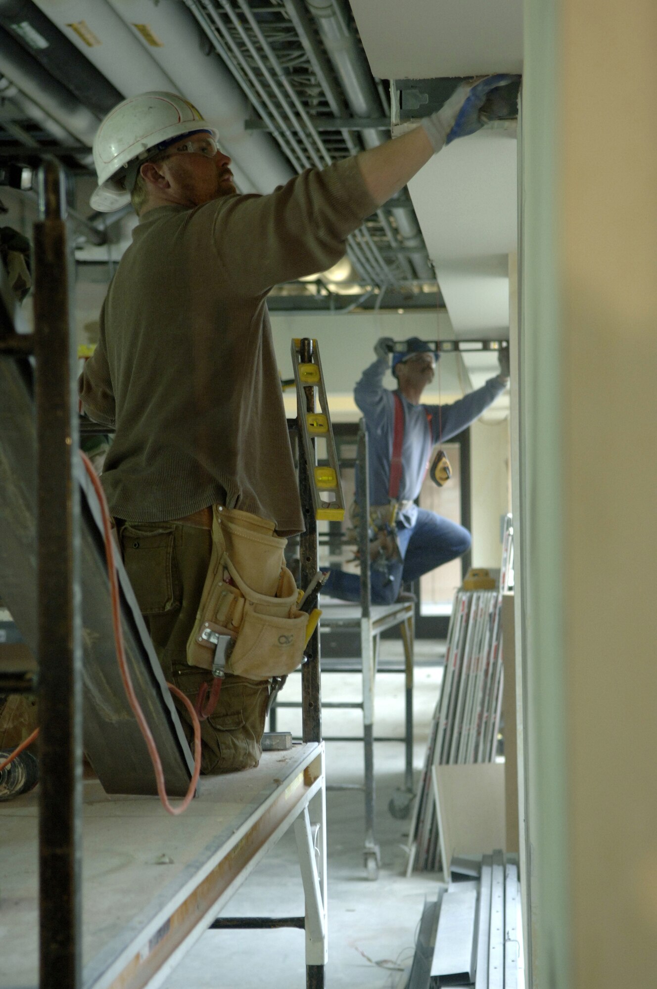 Civilian contractor Casey Dawson frames a softet inside the Air Force Financial Services Center April 2 at Ellsworth Air Force Base, S.D. The AFFSC will consolidate financial services from 93 bases into a single location, employing up to 775 civilian and military personnel, making the AFFSC at Ellsworth the financial hub of the Air Force. (U.S. Air Force photo/Staff Sgt. Michael B.  Keller)