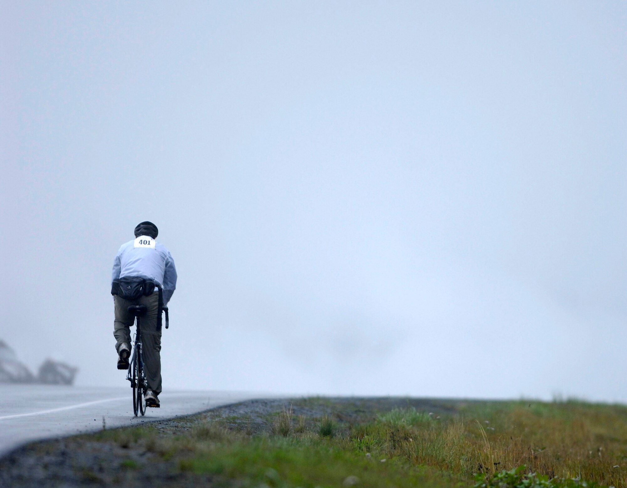 Senior Master Sgt. Don Hendricks participates in the Alaska Multiple Sclerosis Bike Ride Sept. 8 along a section of the Seward Highway in the Kenai Peninsula, Alaska. Consistent and sometimes heavy rains didn't prevent Sergeant Hendricks, a member of the 3rd Component Maintenance Squadron, and other Airmen from Elmendorf Air Force Base, Alaska, from completing the ride, which took place along the Seward Highway from Mile Post 63 to Seward, Alaska. People who took the 126-mile, round-trip ride saw extreme elevation gains challenging even the most experienced of the 200 riders. All proceeds from this event went to the National Multiple Sclerosis Society. (U.S. Air Force photo/Tech. Sgt. Keith Brown)

