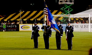 Tech. Sgt. Darryl Allen, 315th Aeromedical-dental Squadron, and Tech. Sgt. Robert Porter, Staff Sgt. David Collins and Senior Airman Myles Alexander, all from the 315th Aircraft Maintenance Squadron, present the colors as members of the Team Charleston Honor Guard for the last Charleston Battery Soccer game of the season  at the Charleston Battery Soccer Field Sept. 7.  (U.S. Air Force photo/Airman 1st Class Nicholas Pilch) 