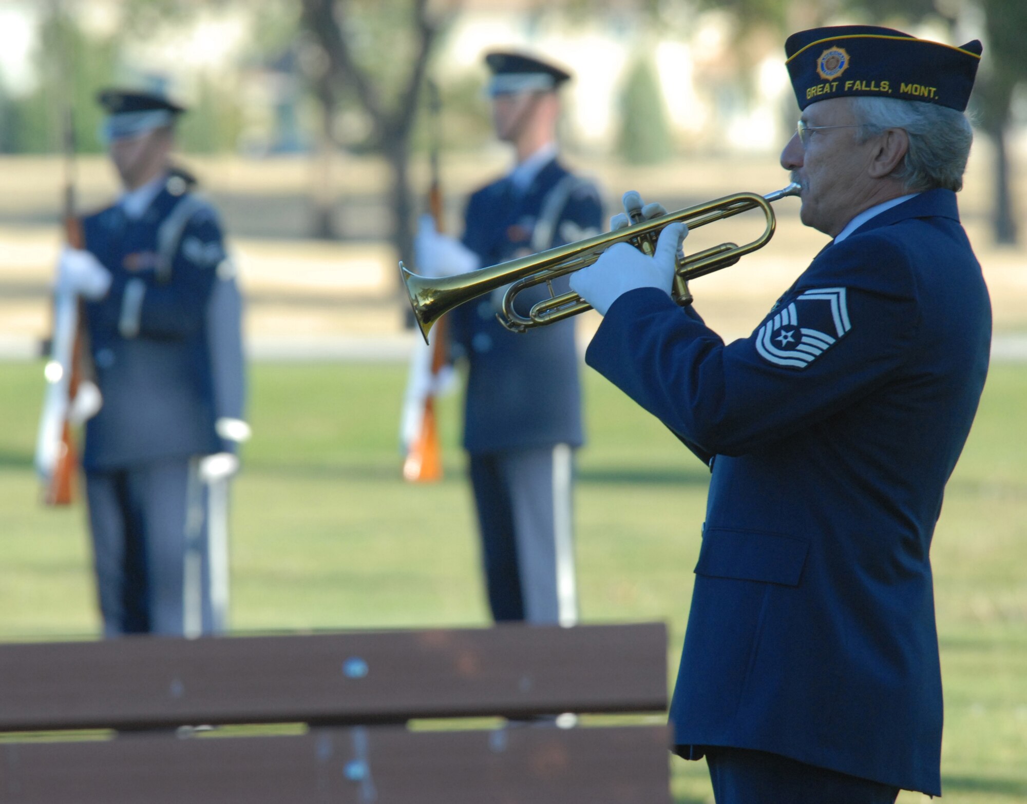 Retired Senior Master Sgt. Royce Shipley plays Taps during a Sept. 11 Rememberance Ceremony at Malmstrom Air Force Base, Mont.,  Sept. 11, 2007. (U.S. Air Force photo/John Turner)