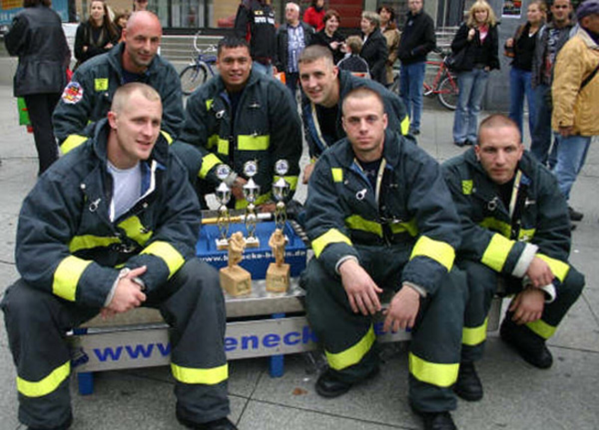 SPANGDAHLEM AIR BASE, Germany – Members of the 52nd Civil Engineer Squadron fire department take a moment to relish in their achievements at the Berlin Firefighter Combat Challenge where they competed against 65 fellow firefighters from Sweden, England, Poland, Russia, Germany and the United States Sept. 8. The firefighters took home 11 awards. (Courtesy photo)