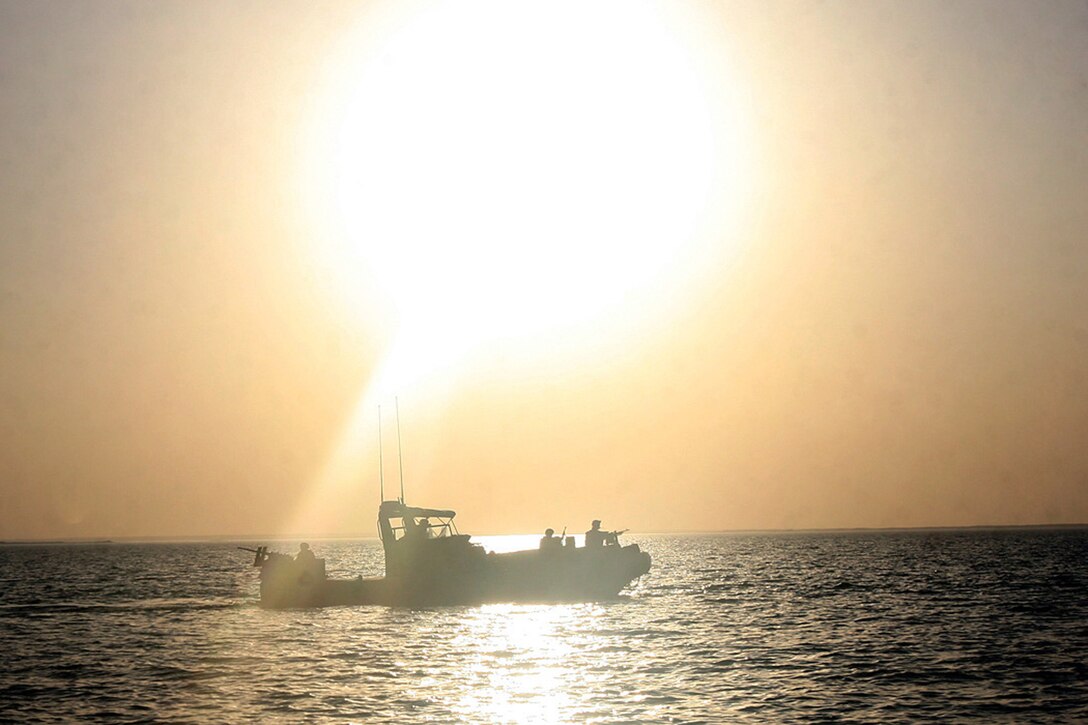 HADITHA DAM, Iraq, (Sept. 16, 2007) – A riverine patrol boat with Detachment 3, Riverine Squadron 1, Riverine Group 1, Navy Expeditionary Combat Command patrols the waters of the Euphrates River. The squadron was stood up, trained, and deployed in less than a year, and is the first Navy riverine unit to be deployed since the Vietnam War. Official Marine Corps Photo By Cpl. Ryan C. Heiser.
