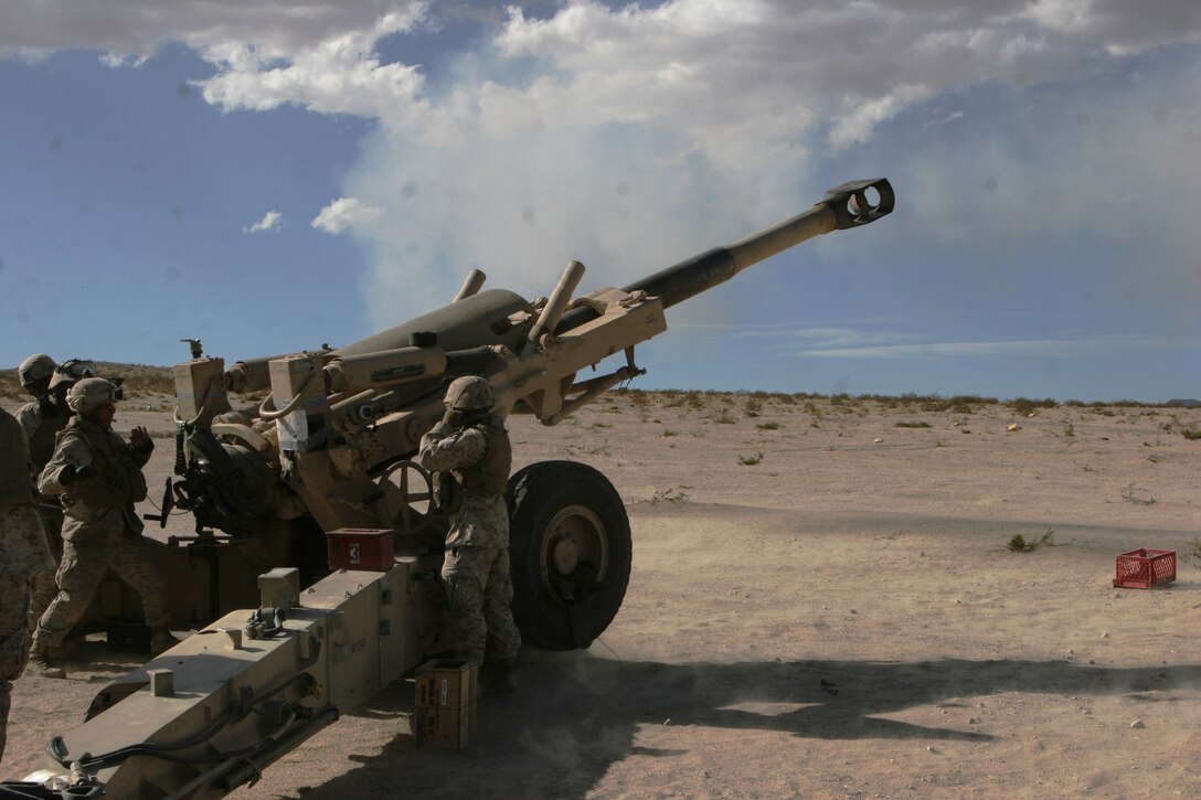Marines from Spartan Battery, 5/11 conduct one of their final fire missions with the M198 howitzer at the Quackenbush training area Sept. 13.