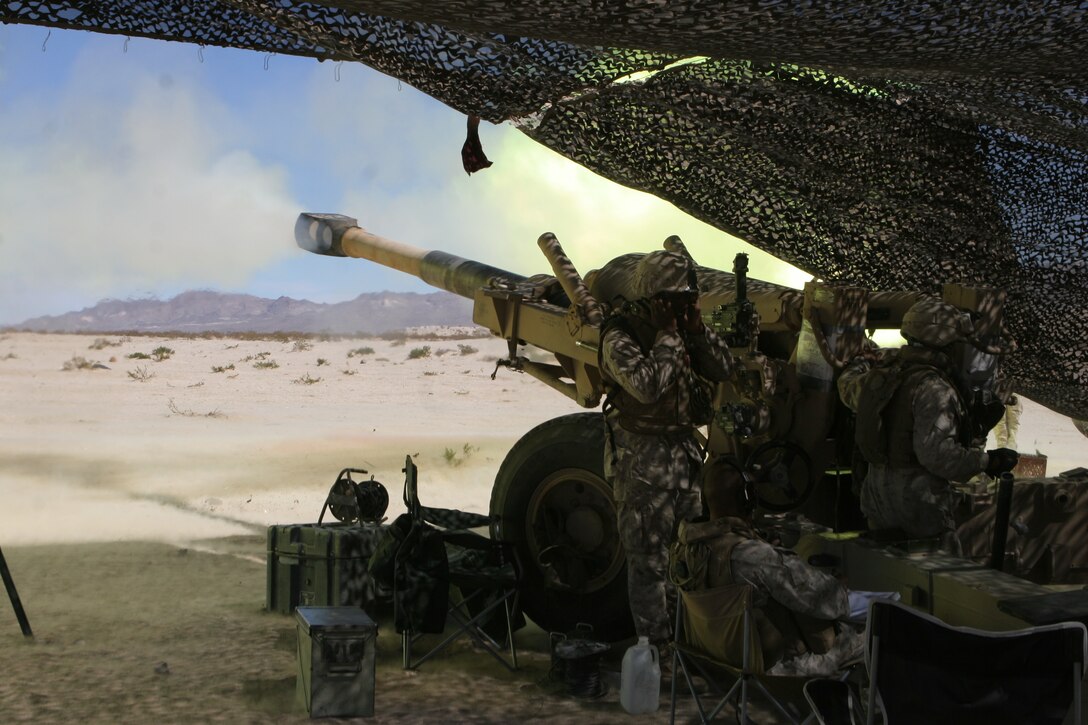 Marines from Spartan Battery, 5/11 conduct one of their final fire missions with the M198 howitzer at the Quackenbush training area Sept. 13.