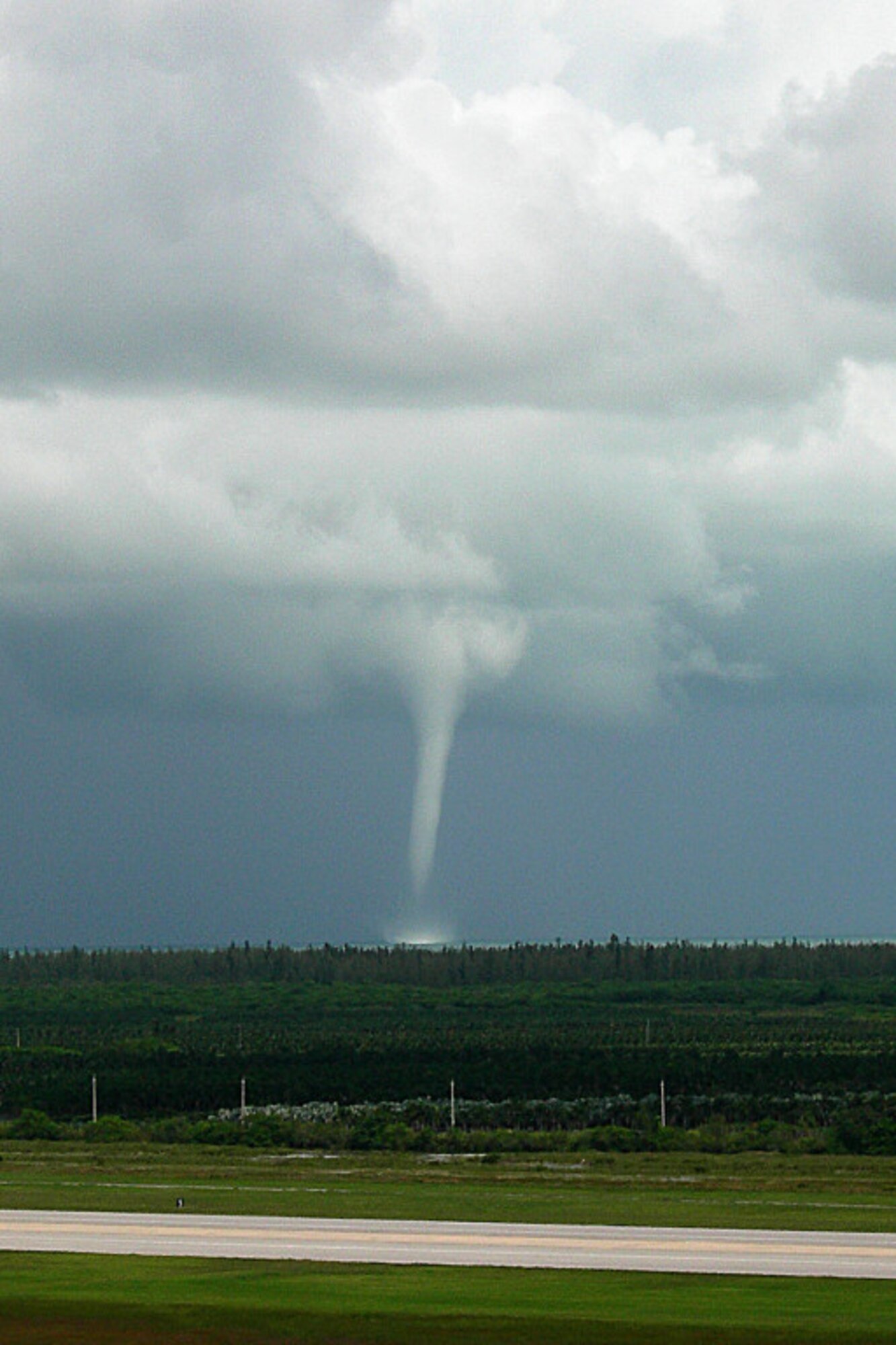 A waterspout photographed from the Homestead Air Reserve Base air traffic control tower churns up the bay in Biscayne National Park Sept. 8, 2007.  Air traffic controllers from the 482nd Operations Support Flight said the waterspout touched down at approximately 2:30 p.m. lasting approximately 15 minutes before dissipating.   Biscayne National Park is located approximately 2 miles east of the air base. (U.S. Air Force photo/Mr. David Curry)