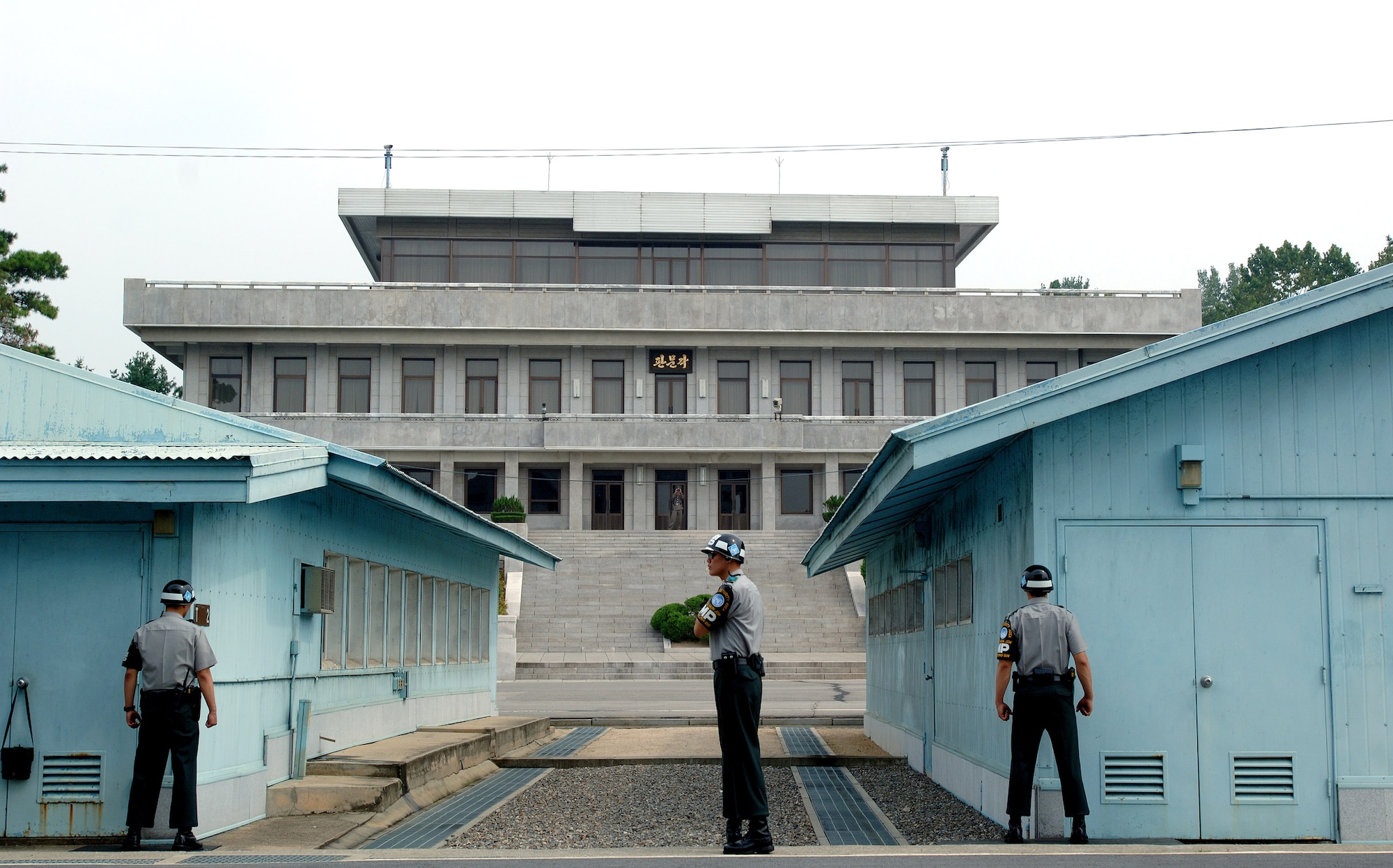 South Korean military police stand guard in the Korean Demilitarized Zone during a Sept. 13 tour held to honor Korean War veterans in Panmunjeom, South Korea. The joint security area is the only place where North and South connect. Air Force Korean War veterans were visiting South Korea during a weeklong tour in observance of the Air Force's 60th Anniversary.  (U.S. Air Force photo/Staff Sgt. Bennie J. Davis III) 
