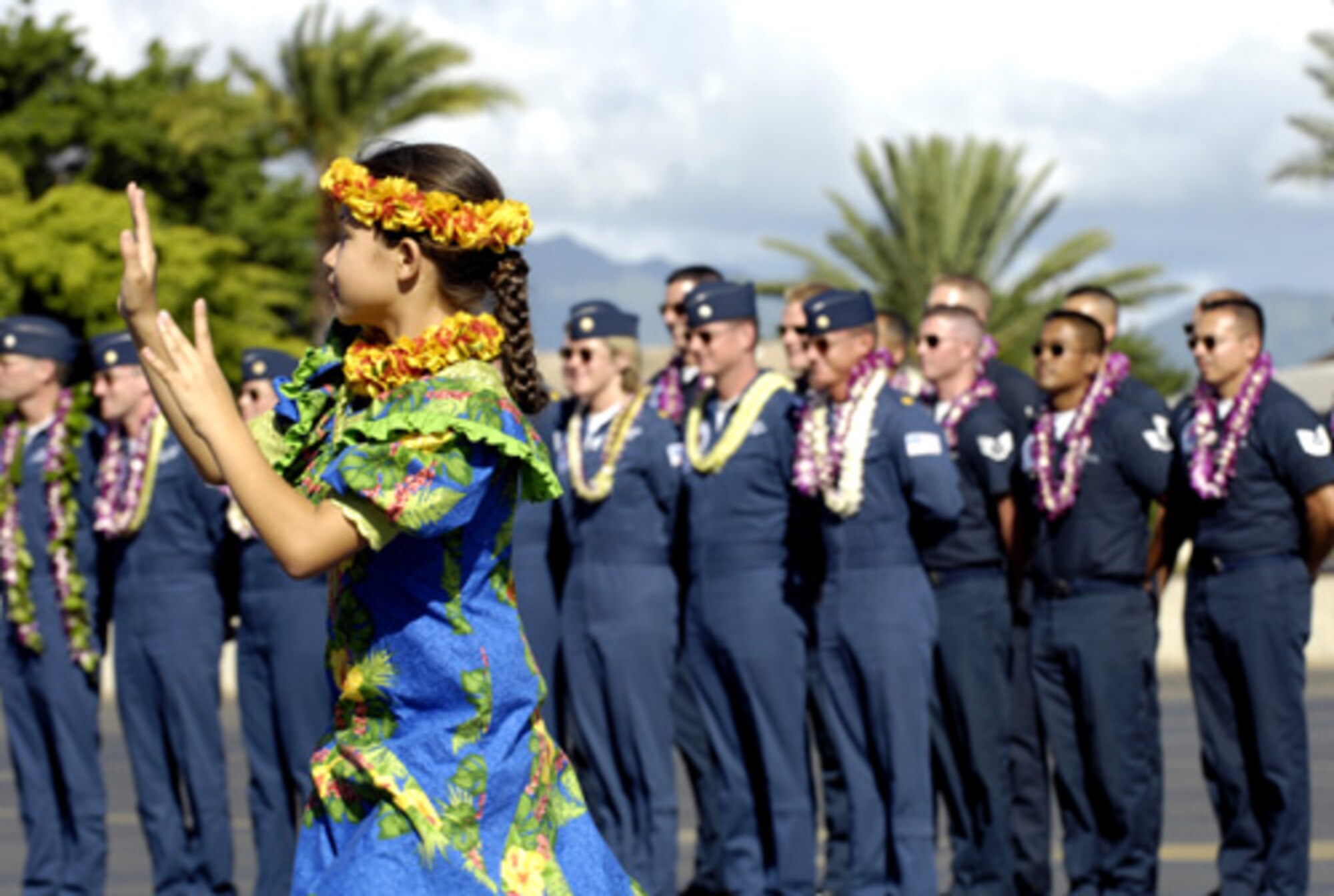 HICKAM AIR FORCE BASE, Hawaii -- The Thunderbirds Demonstration Team receives a warm welcome Sept. 12 during an arrival ceremony here. The Thunderbirds will be performing as part of Air Force Week Honolulu. (U.S. Air Force photo/Tech. Sgt. Shane A. Cuomo)