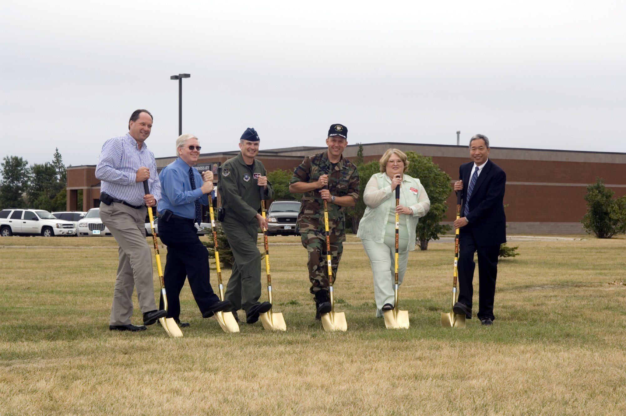 MINOT AIR FORCE BASE, N.D. -- Minot Air Force Base held a groundbreaking
ceremony for the construction of a new Base Exchange and Shoppette Sept. 6
at the west end of the commissary. The new Shoppette is scheduled to be complete by late 2008, and the new BX is scheduled for spring/summer 2009. The projected cost is approximately $17.4 million.(U.S. Air Force photo by Airman 1st Class Joe Rivera)