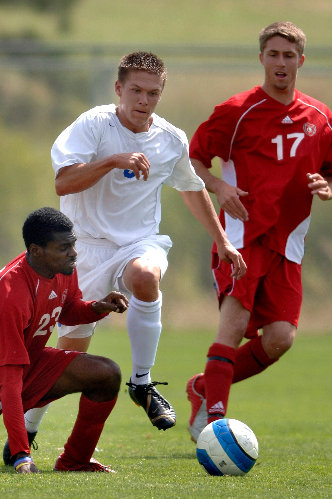 Freshman Kyle Schafer drives the ball through defenders as Air Force posts its second consecutive shutout with a 1-0 victory over St. Francis University in men's soccer action Sept. 9 at the U.S. Air Force Academy Cadet Soccer Stadium in Colorado Springs, Colo. With the victory, Air Force improved to 2-2 this season, while St. Francis fell to 1-3. (U.S. Air Force photo/Mike Kaplan)