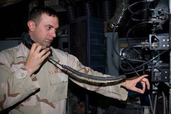 SOUTHWEST ASIA -- Staff Sgt. Shawn Bridges troubleshoots a URC-200 for periodic maintenance inspection here on September 13.  Sgt. Bridges is a Ground Mobile Radio Technician technician assigned to the 386th Expeditionary Communications Squadron and is deployed from Spangdahlem Air Base, Germany.  (U.S. Air Force photo by Staff Sgt. Tia Schroeder)