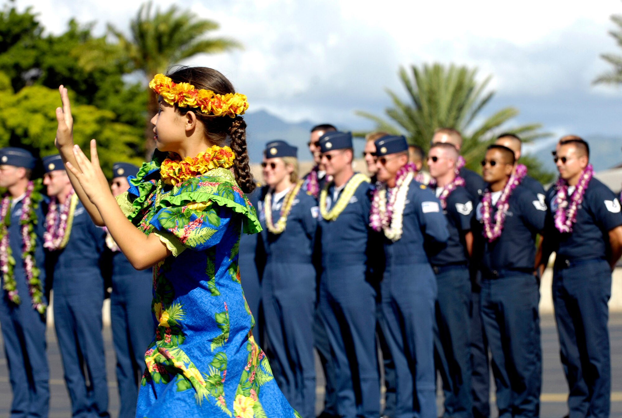 Members of the Air Force Air Demonstration Squadron, the Thunderbirds, are welcomed to Hickam Air Force Base, Hawaii, Sept. 12. The team is performing as part of Air Force Week Honolulu, which runs Sept. 8 through 15. (U.S. Air Force photo/Tech. Sgt. Shane A. Cuomo) 