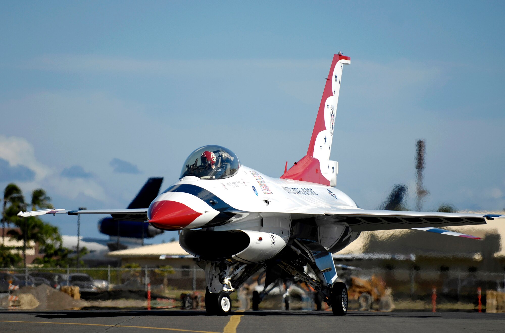 A Thunderbird taxies to its parking spot during an arrival ceremony Sept. 12 at Hickam Air Force Base, Hawaii. The Thunderbirds, the Air Force Air Demonstration Squadron, are performing as part of Air Force Week Honolulu, which runs Sept. 8 through 15. (U.S. Air Force photo/Tech. Sgt. Shane A. Cuomo) 
