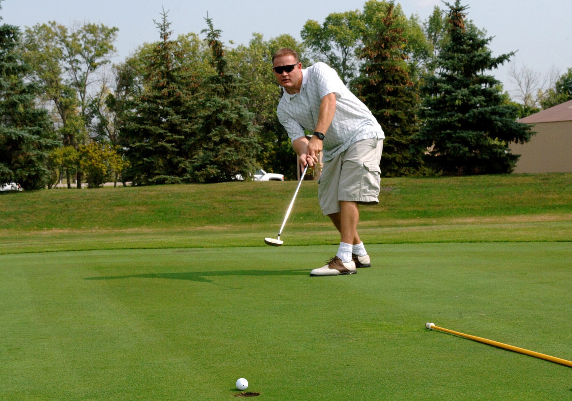 Tech. Sgt. Reed Honsey, 319th Communications Squadron  participants with Wing leaders used putters and drivers to support Airmen Against Drunk Driving during the AADD golf tournament Sept. 5 at a local golf course. AADD supports the wing?s mission of creating a culture of responsible drinking by maintaining a staff of on-call volunteers who are available to give rides home to Airmen (U.S. Air Force photo/Senior Airman SerMae Lampkin)
