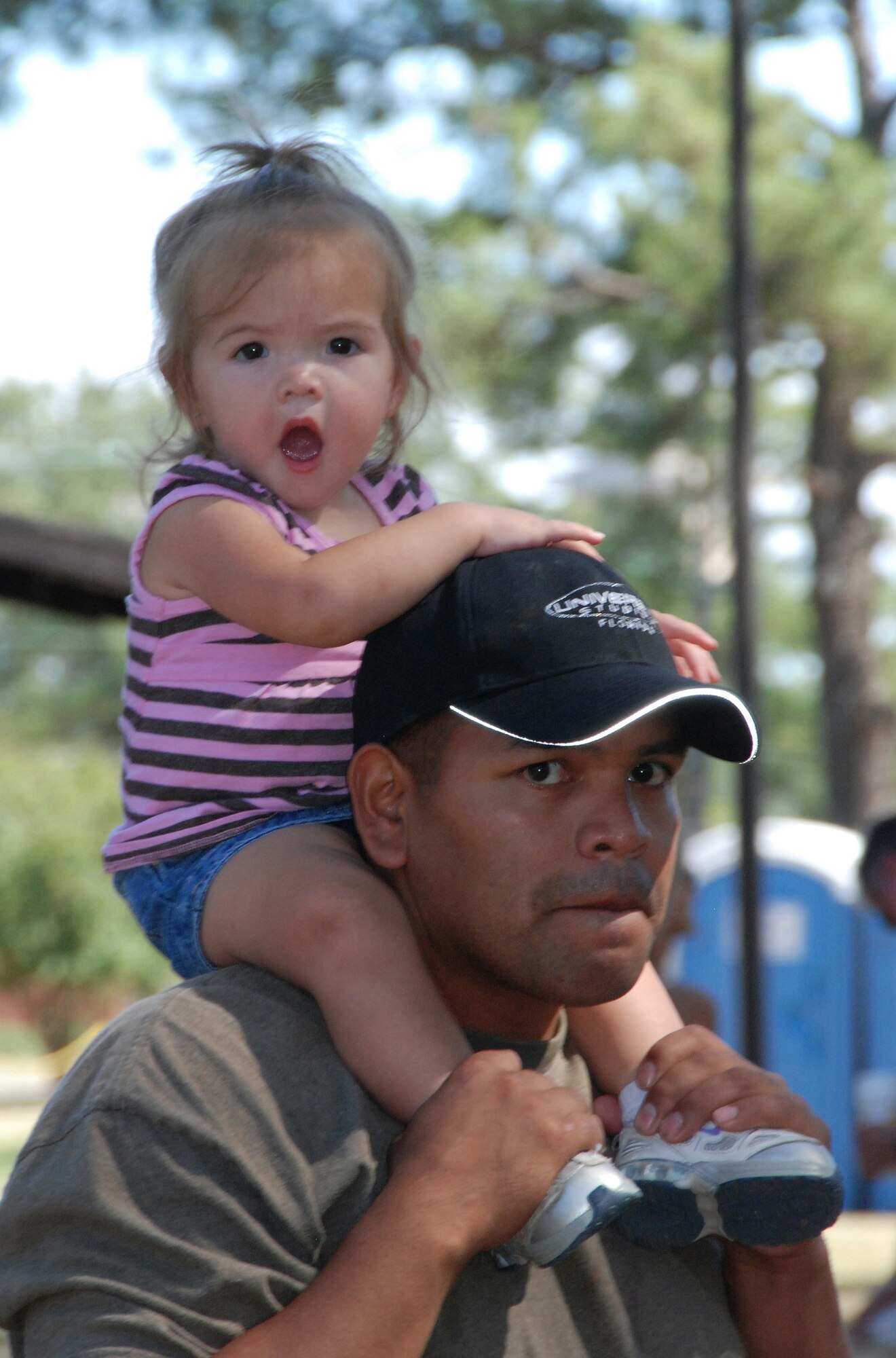 SEYMOUR JOHNSON AIR FORCE BASE, N.C.--Father and daughter enjoy time together during the 916th Air Refueling Wing, Air Force Reserve, family day picnic in September.  