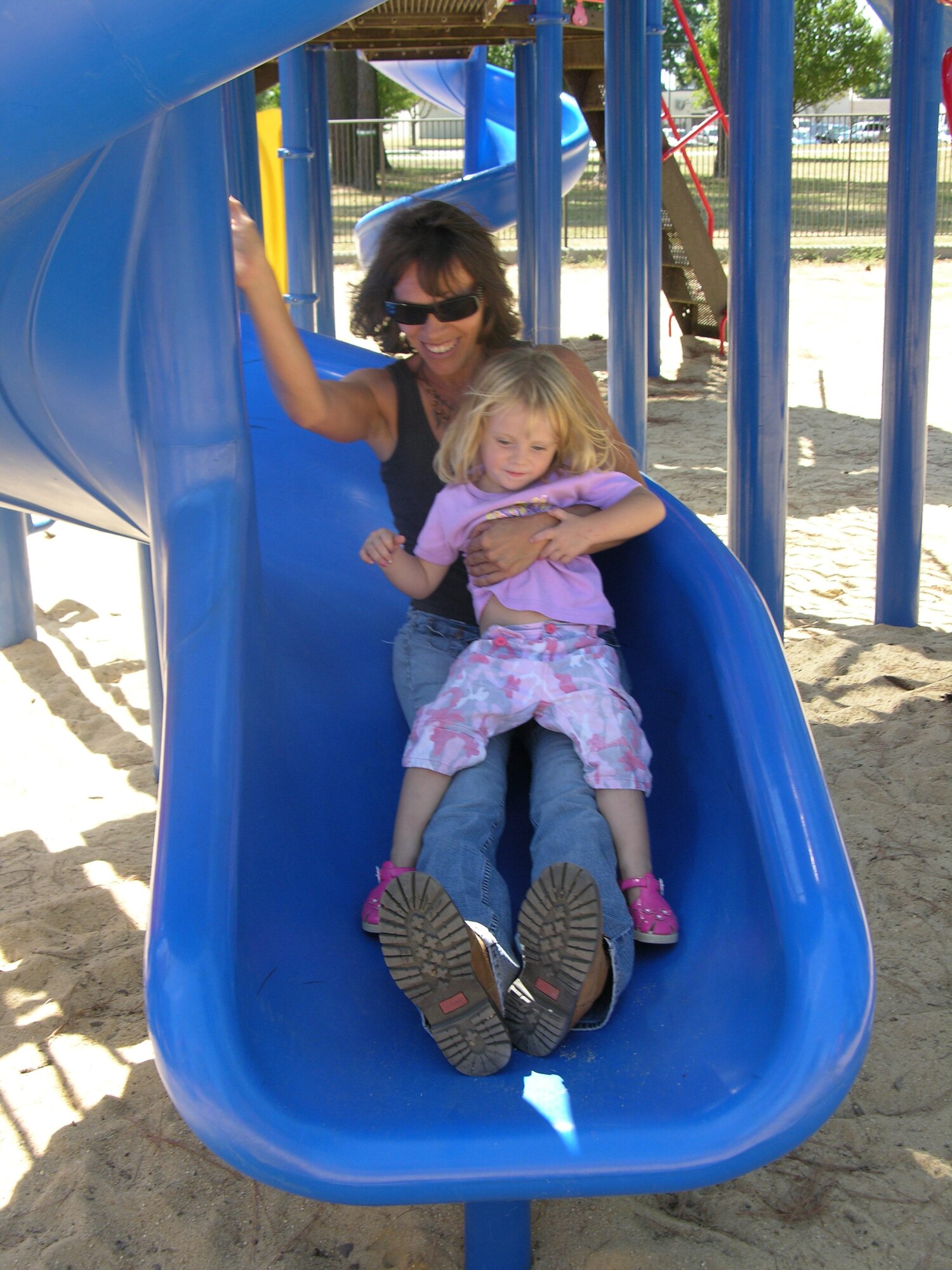 SEYMOUR JOHNSON AIR FORCE BASE, N.C.-- Away we go!  Family members of the 916th Air Refueling Wing, Air Force Reserve, have a good time with the playground equipment at the family day picinic that was held during the September unit training assembly.