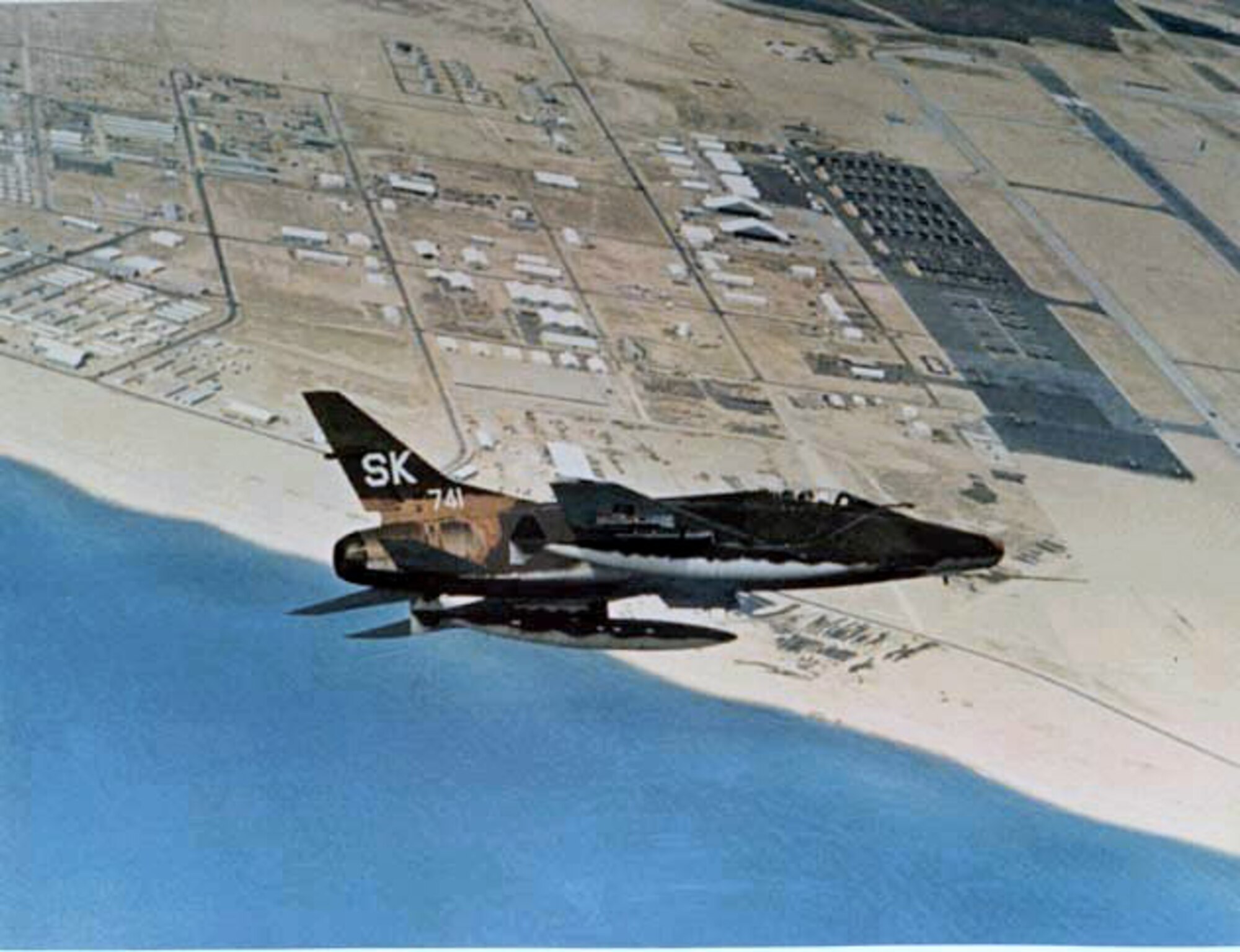 An F-100 Super Sabre flies over the base at Tuy Hoa, South Vietnam in 1967. (Courtesy photo)