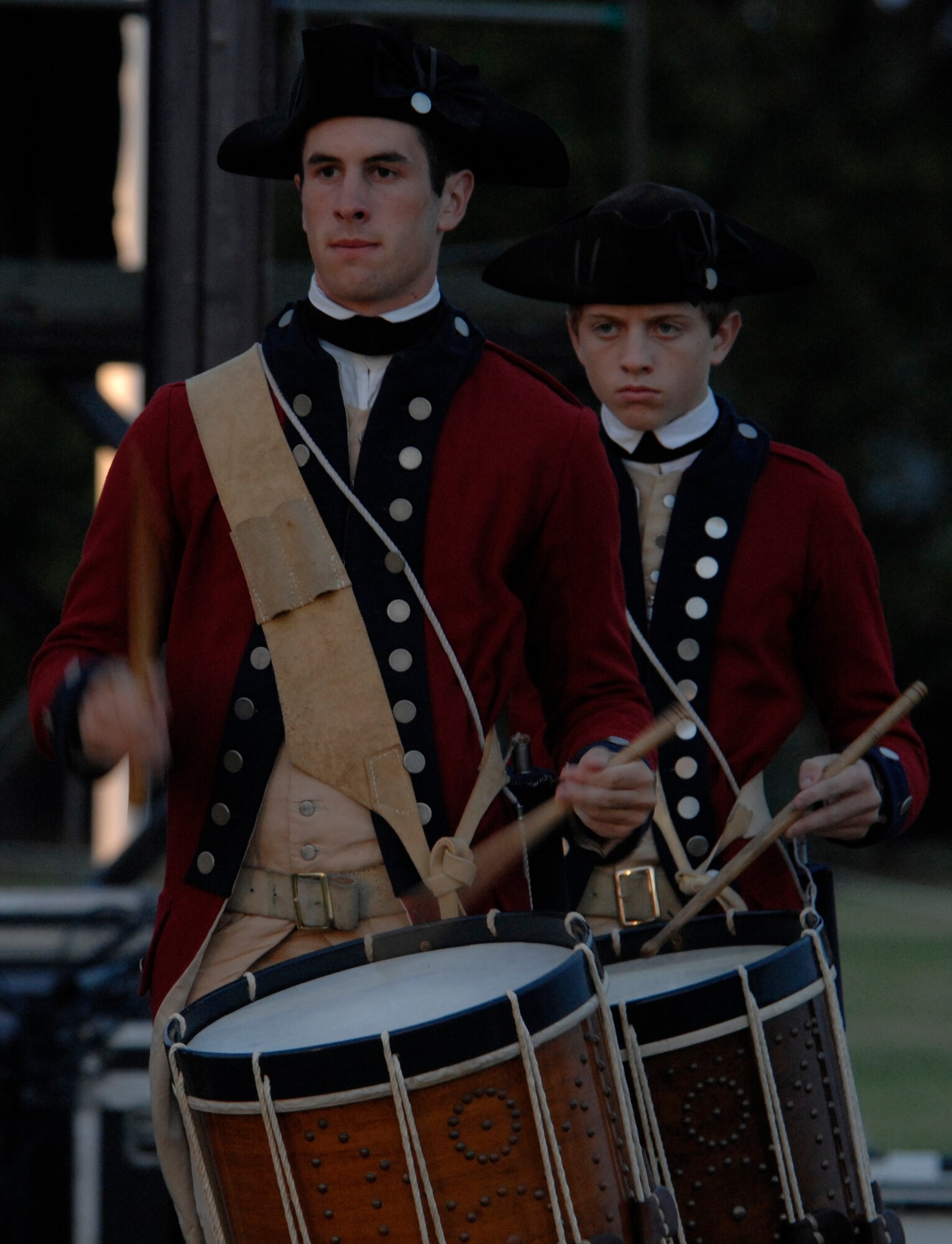 Members of the Fifes and Drums of Colonial Williamsburg perform during the Air Combat Command Tattoo Sept. 13. This year’s Tattoo celebrated the Air Force’s 60th birthday, and showcased a military tradition that began more than 300 years ago. (U.S. Air Force photo/Airman 1st Class Aaron Johnson)