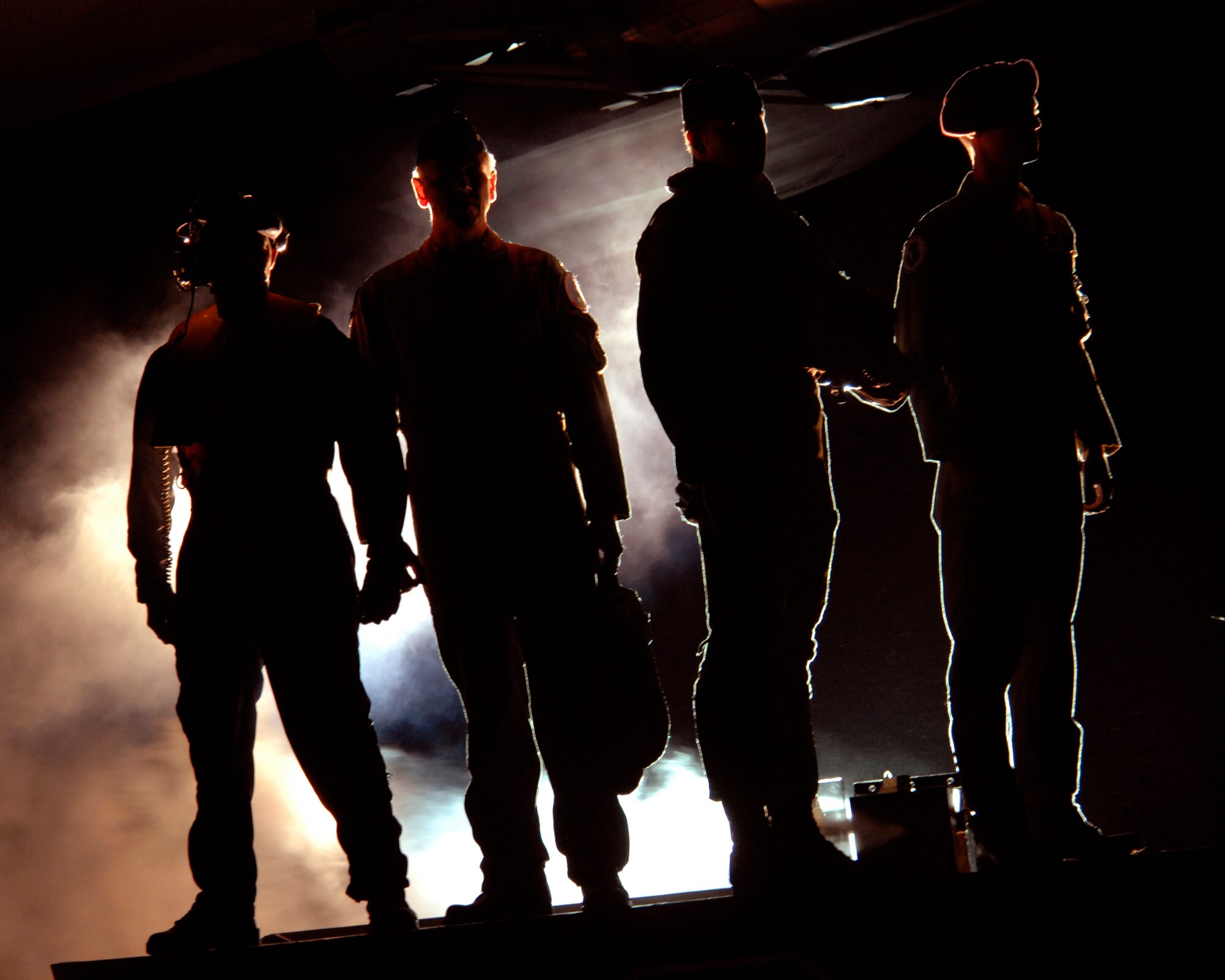The 2007 Air Combat Command Tattoo memorial tribute paid respect to fallen Airmen of several wars. The Airmen portraying these "ghosts" occupy the same Air Force Specialty Code as the fallen Airmen they represent. (U.S. Air Force photo/Airman 1st Class Aaron Johnson)