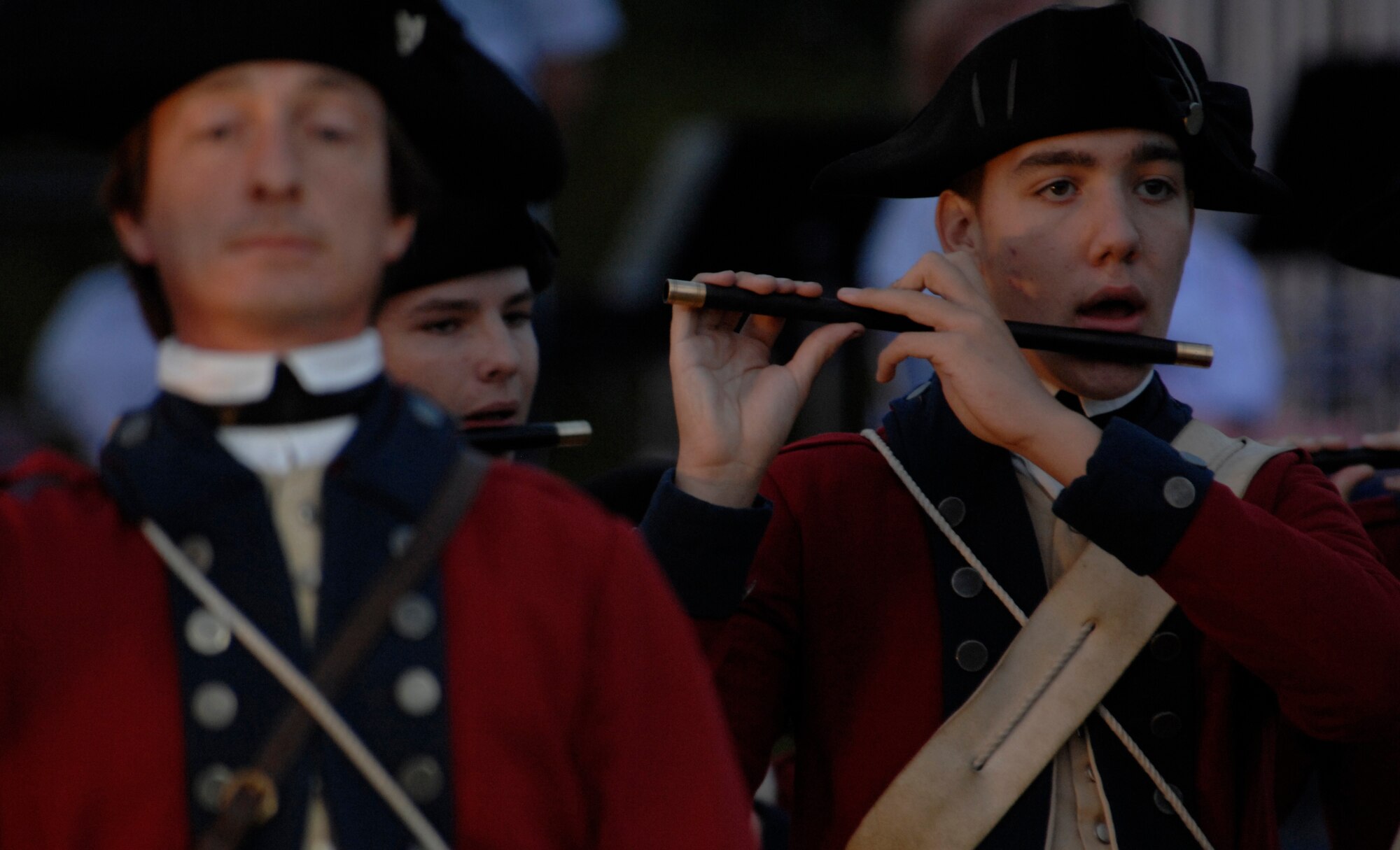 Members of the Fifes and Drums of Colonial Williamsburg perform during the Air Combat Command Tattoo Sept. 13. This year’s Tattoo celebrated the Air Force’s 60th birthday, and showcased a military tradition that began more than 300 years ago. (U.S. Air Force photo/Airman 1st Class Aaron Johnson)