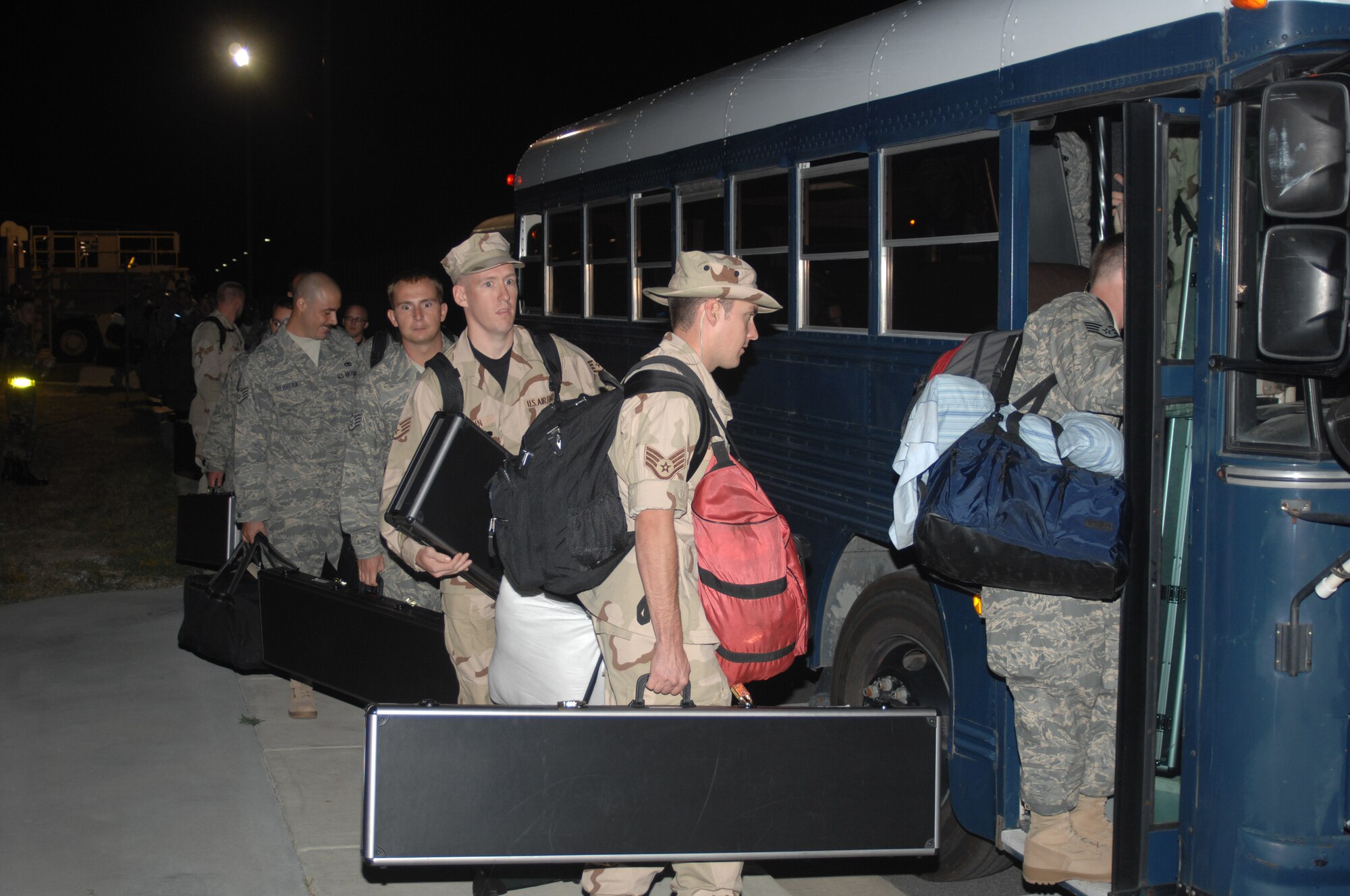 SEYMOUR JOHNSON AFB, NC ? Airmen from the 4th Fighter Wing get on a bus to be transported to a C-17 on Sept. 14, 2007 at Seymour Johnson AFB, NC.  The Airmen are deploying to Southwest Asia in support of the Global War on Terror.  (US Air Force photo by Senior Airman Chad Trujillo)(released)