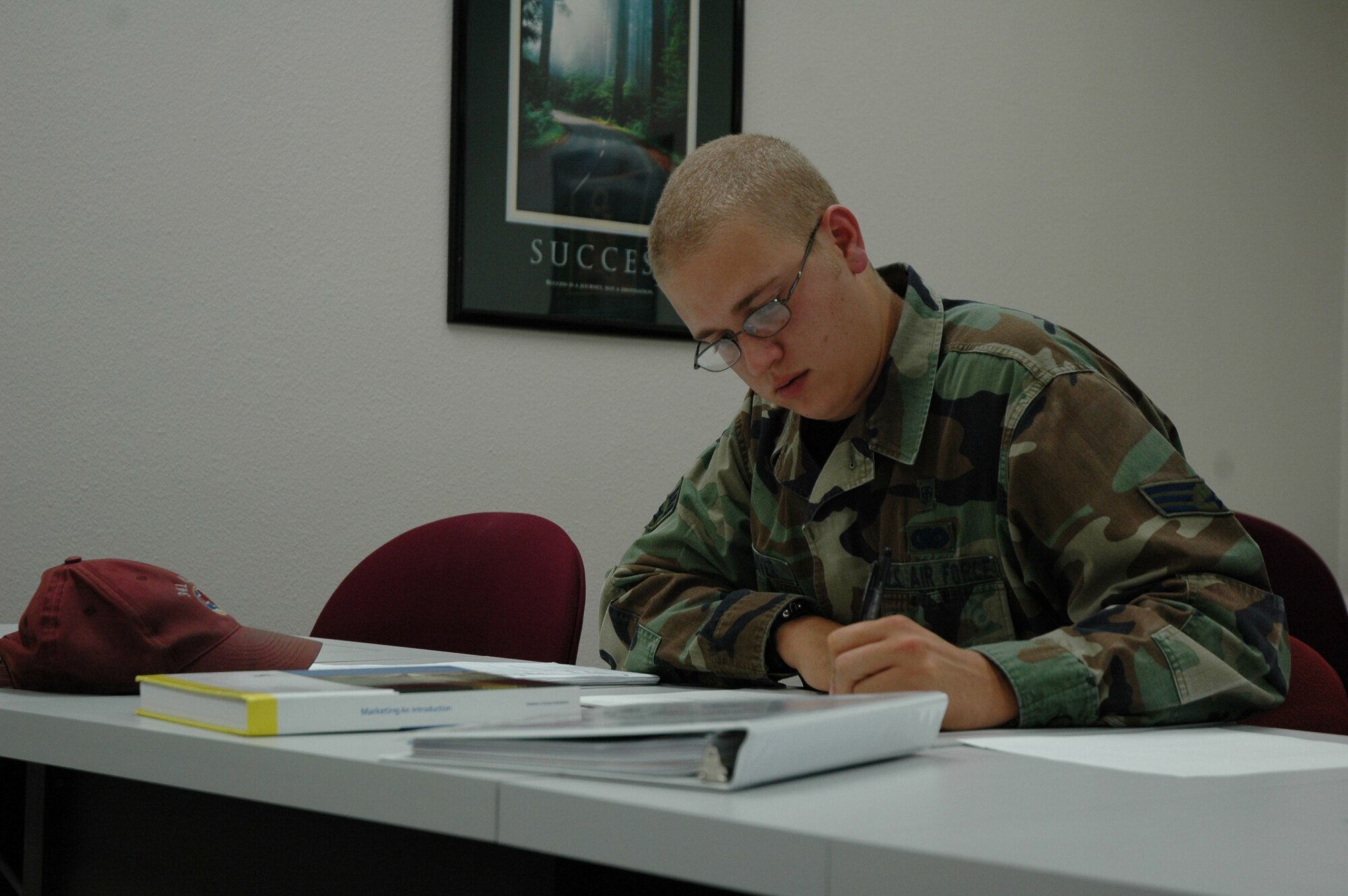 Senior Airman Christopher Vandiver, 341st Medical Operations Squadron, takes a college test at the Education and Training Center Sept. 11. The education center offers CLEP, DANTES and other college tests each Tuesday and Thursday. (U.S. Air Force photo / Airman 1st Class Emerald Ralston)