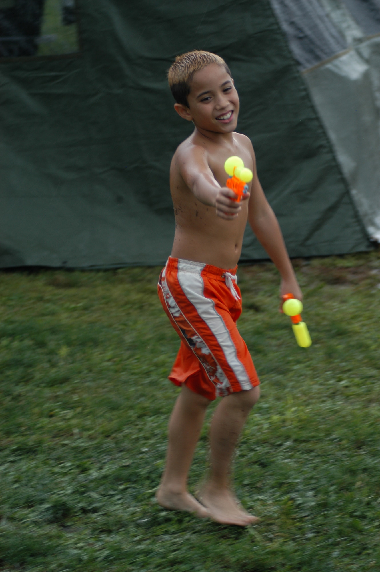 GRISSOM AIR RESERVE BASE, Ind, -- The rain did not damper the spirits of one youngster during the recent family day activities at Grissom. (U.S. Air Force photo/Staff Sgt. Mark Orders-Woempner)