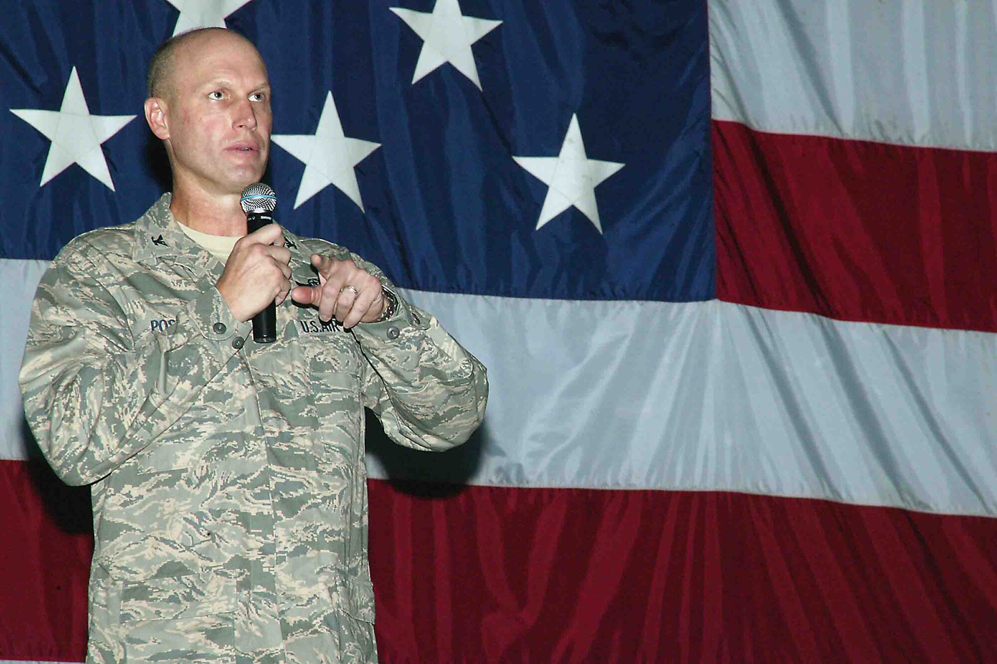 SHAW AIR FORCE BASE, S.C. -- Col. Jim Post, 20th Fighter Wing commander, speaks to the men and women of the 20th FW during a commander's call Sept. 14. The colonel expressed his pride in the wing and with their performance during the recent Operational Readiness Inspection. Colonel Post also spoke about the importance of taking care of your wingmen and looking out for each other. (U.S. Air Force photo/Senior Airman John Gordinier)