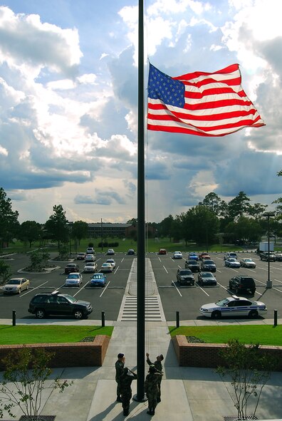 Members of the 23rd Wing at Moody Air Force Base, Ga., retire the colors during a retreat ceremony Sept. 13 at the Parker Greene Consolidated Base Support Center.   (U.S. Air Force photo by Tech. Sgt. Parker Gyokeres)
