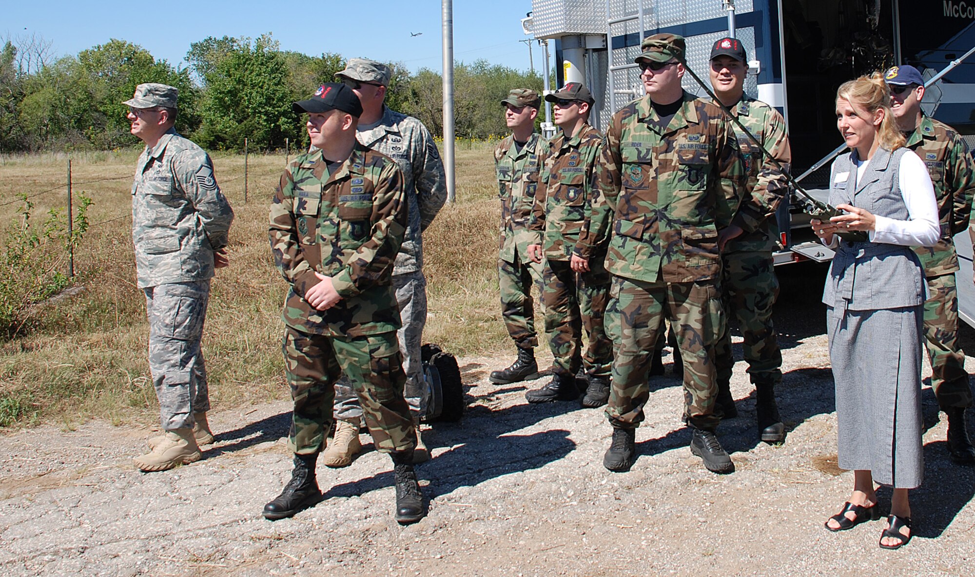 MCCONNELL AIR FORCE BASE, Kan. -- Lisa Spillman, honorary commander for the 22nd Logistics Readiness Squadron, has a hands-on opportunity to detonate an explosive during an honorary commander tour at the explosive ordnance disposal range Sept. 11. The event was an orientation of the 22nd Mission Support Group to see how it provides quality-of-life and installation support for the entire McConnell community.  (Photo by Airman 1st Class Jessica Lockoski)